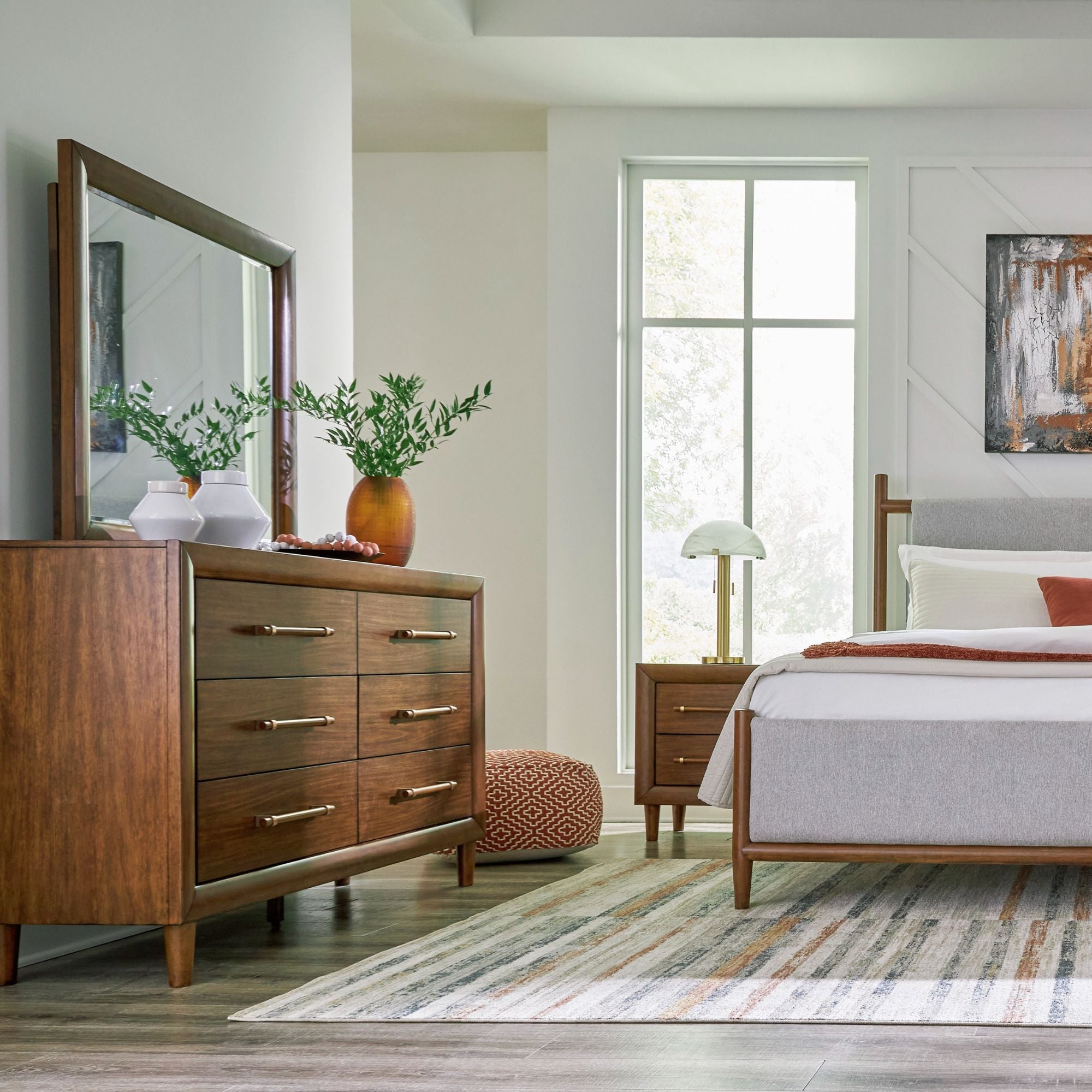 Lyncott upholstered panel bedroom set by Signature Design Ashley with a bed, nightstands, and matching bedroom furniture.