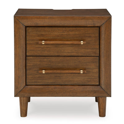 Lyncott two-drawer nightstand by Signature Ashley with wood finish and modern design, featuring sleek handles and sturdy construction.