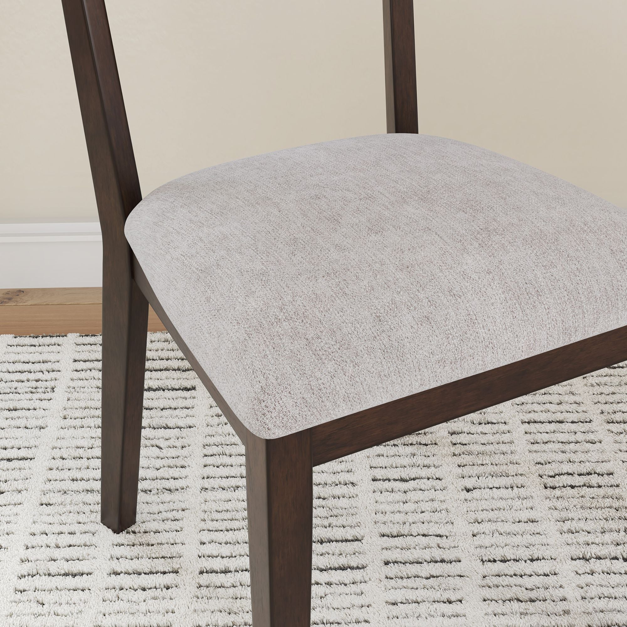 Dark brown Mallenette 5-piece dining room set by Ashley with a table and matching chairs, stylish and modern for dining spaces.