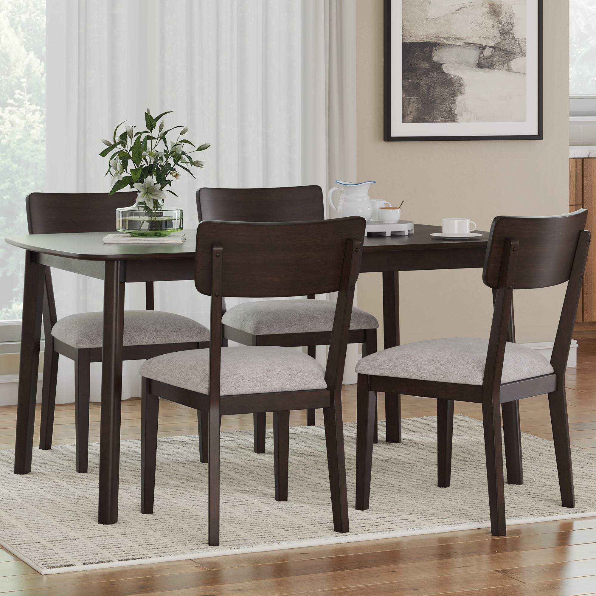 Ashley Mallenette 5-piece dark brown dining room set with a table and matching chairs, ideal for modern dining spaces.
