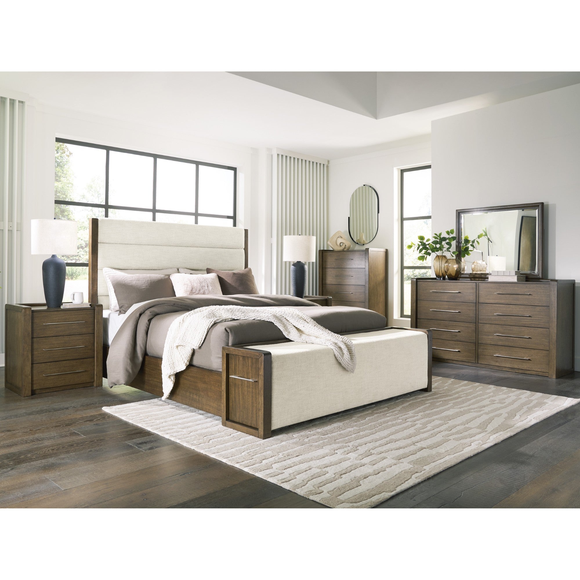 Marxmore upholstered storage bedroom bed from Signature Ashley with a padded headboard and built-in storage drawers in a modern bedroom setting.