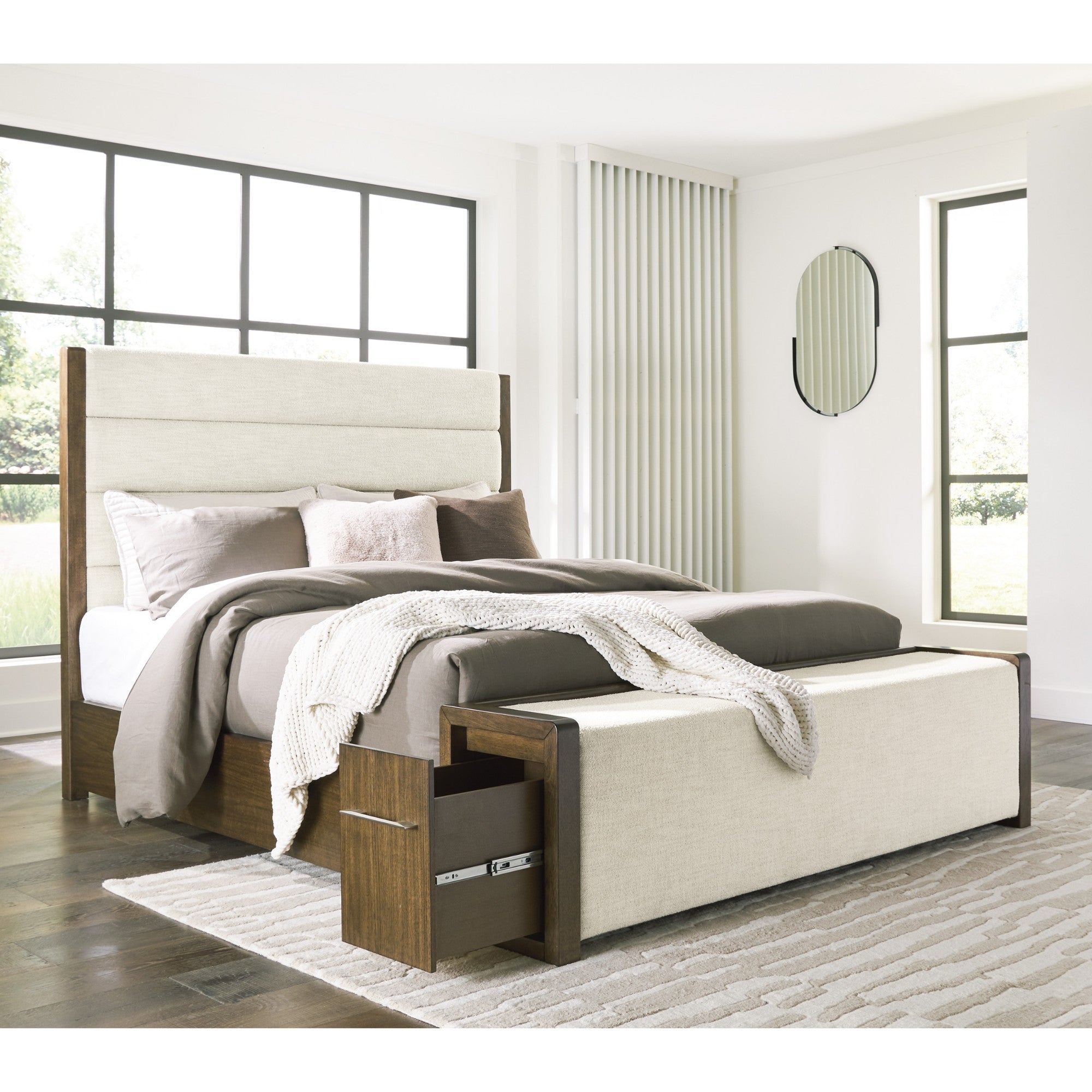 Signature Ashley Marxmore upholstered storage bedroom bed with a padded headboard and built-in storage drawers.