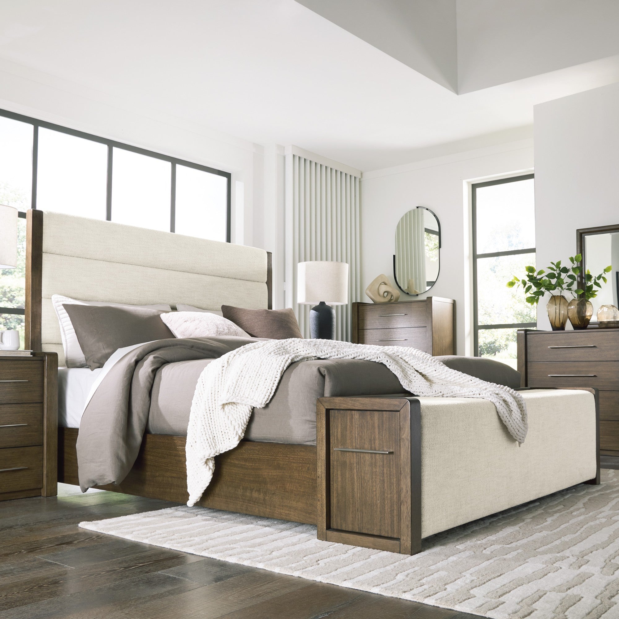 Signature Ashley Marxmore upholstered storage bed with padded headboard and built-in drawers in a modern bedroom setting.