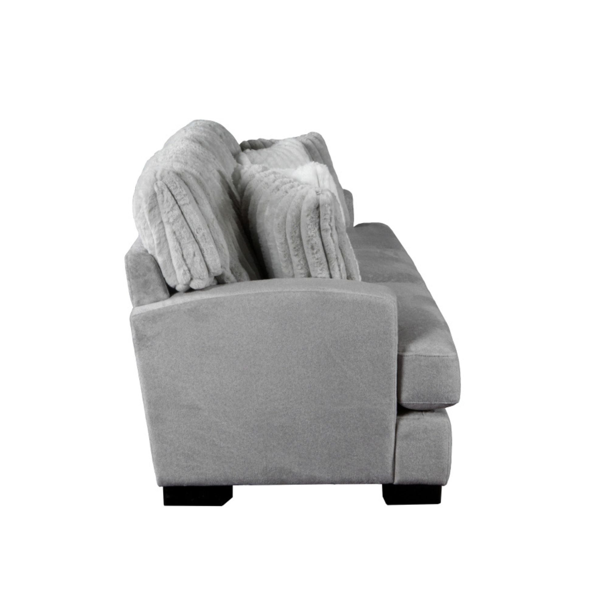 MAZ Imogen 3-seat sofa with plush cushions and modern design, featuring neutral fabric upholstery in a stylish living room setting.