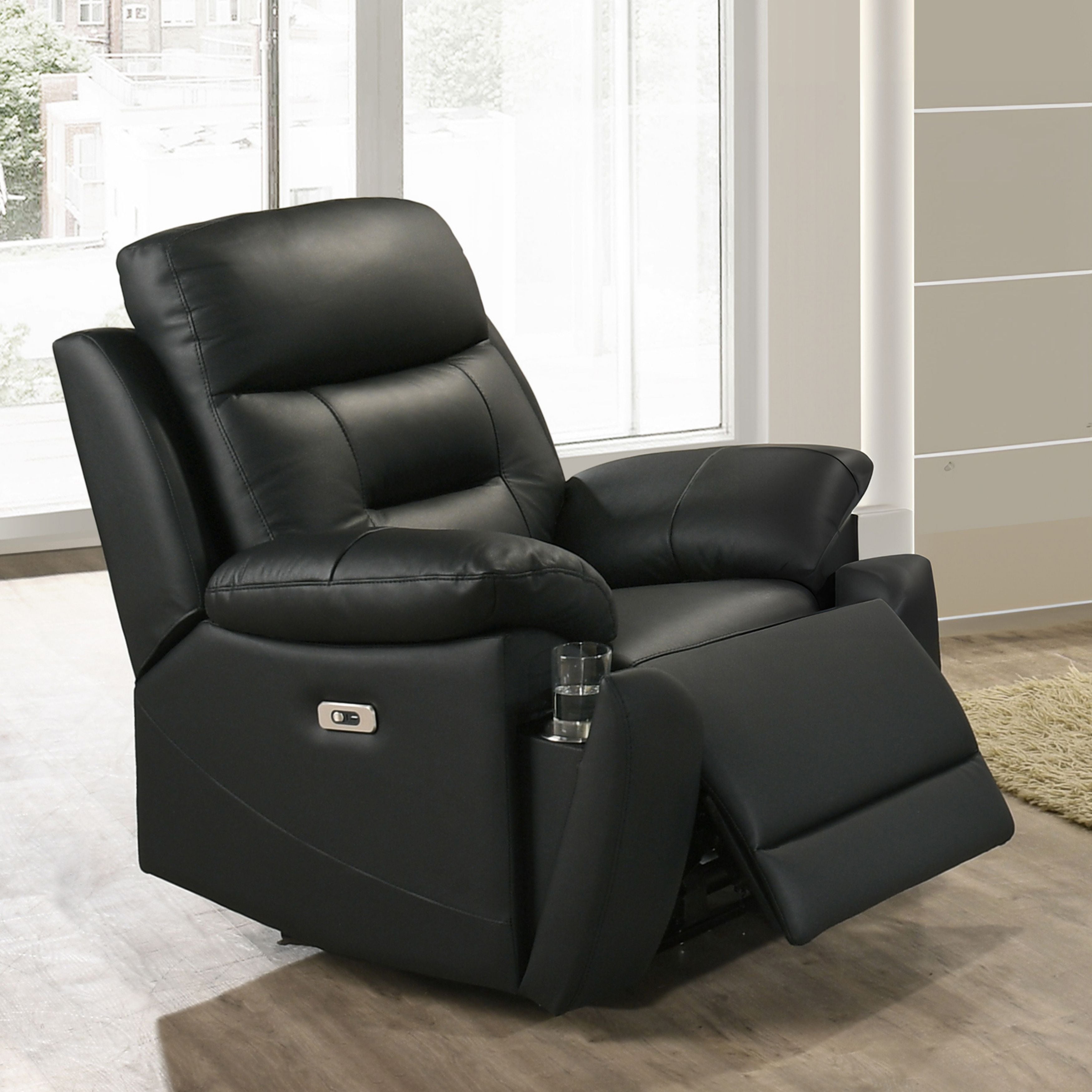 Black Milan Luxe leather power recliner by IFF, showing the plush, modern reclining chair with padded armrests and sleek design.