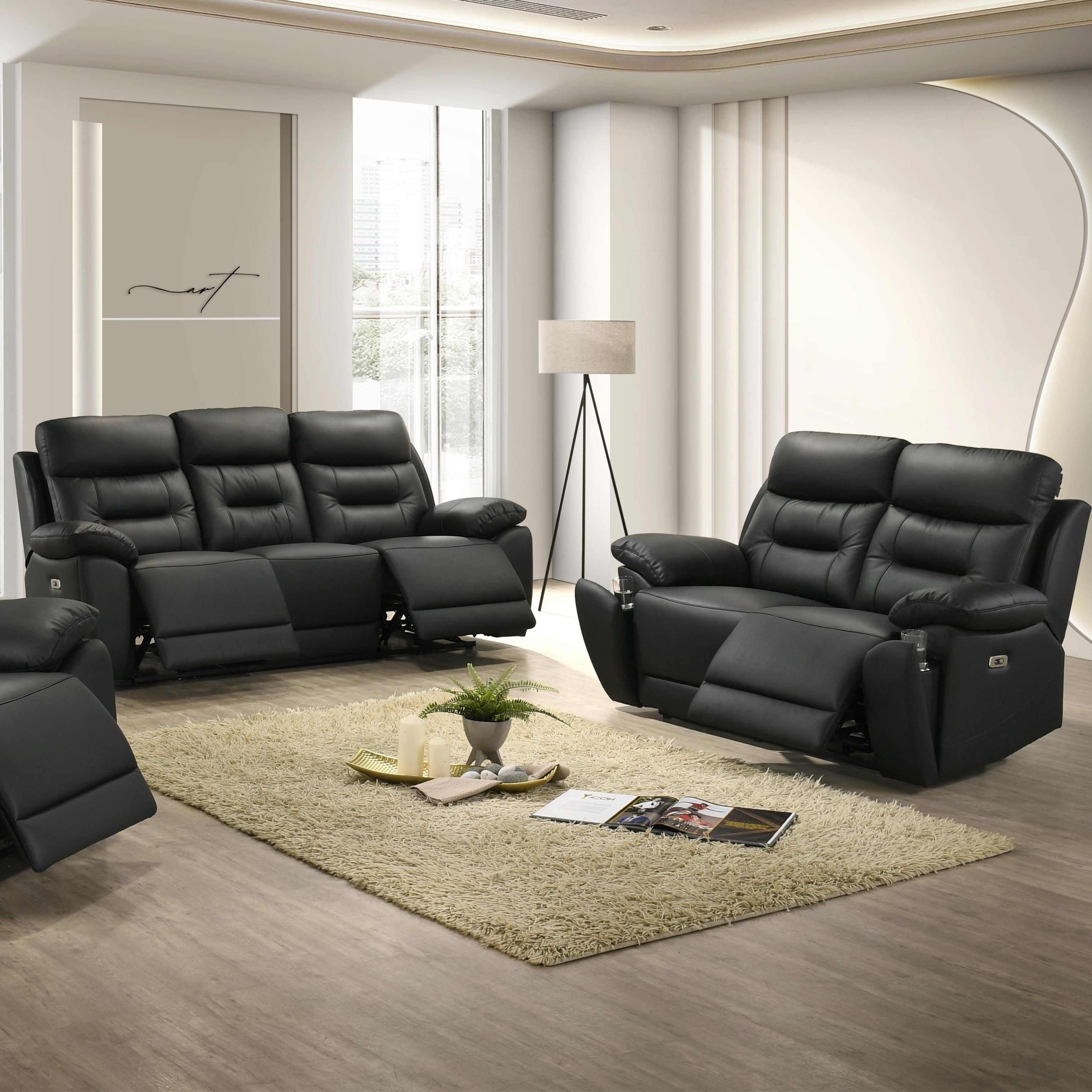 Black Milan Luxe leather power recliner sofa set by IFF featuring plush cushions and modern design in a stylish living room setting.