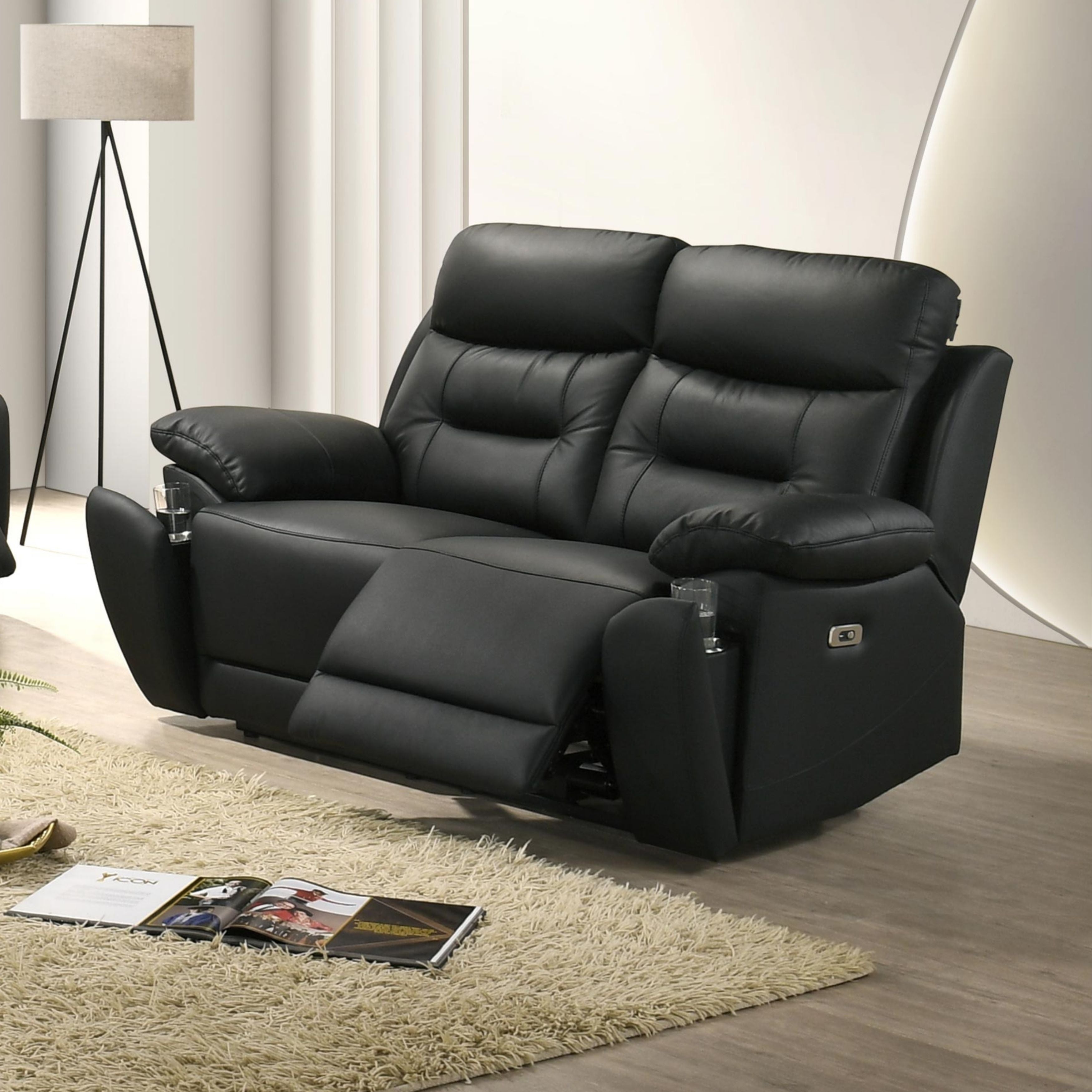 Black Milan Luxe leather power recliner loveseat by IFF, showcasing plush cushions and modern reclining design.