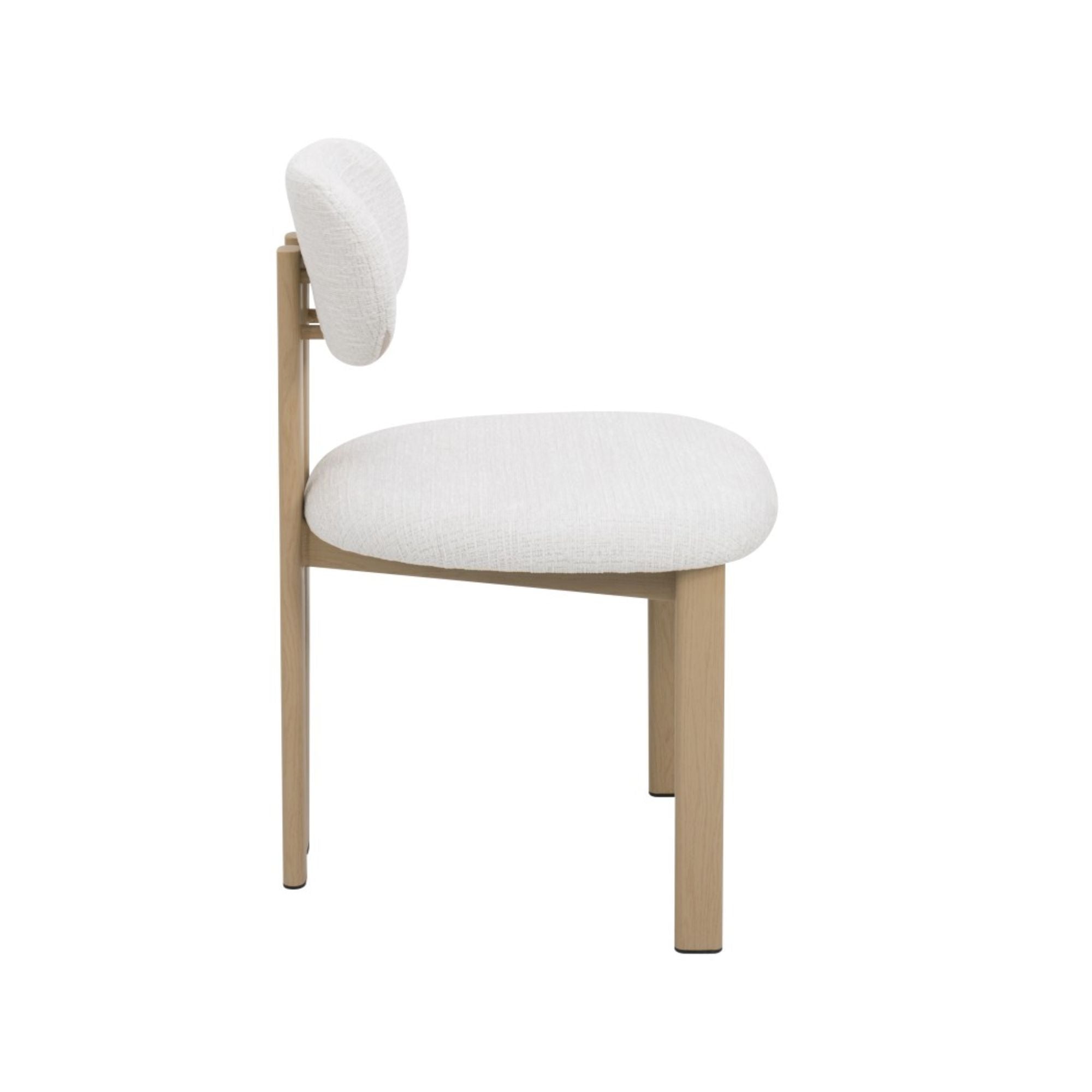Pair of grey Brassex Milo dining chairs with sleek modern design, featuring cushioned seats and wooden legs.
