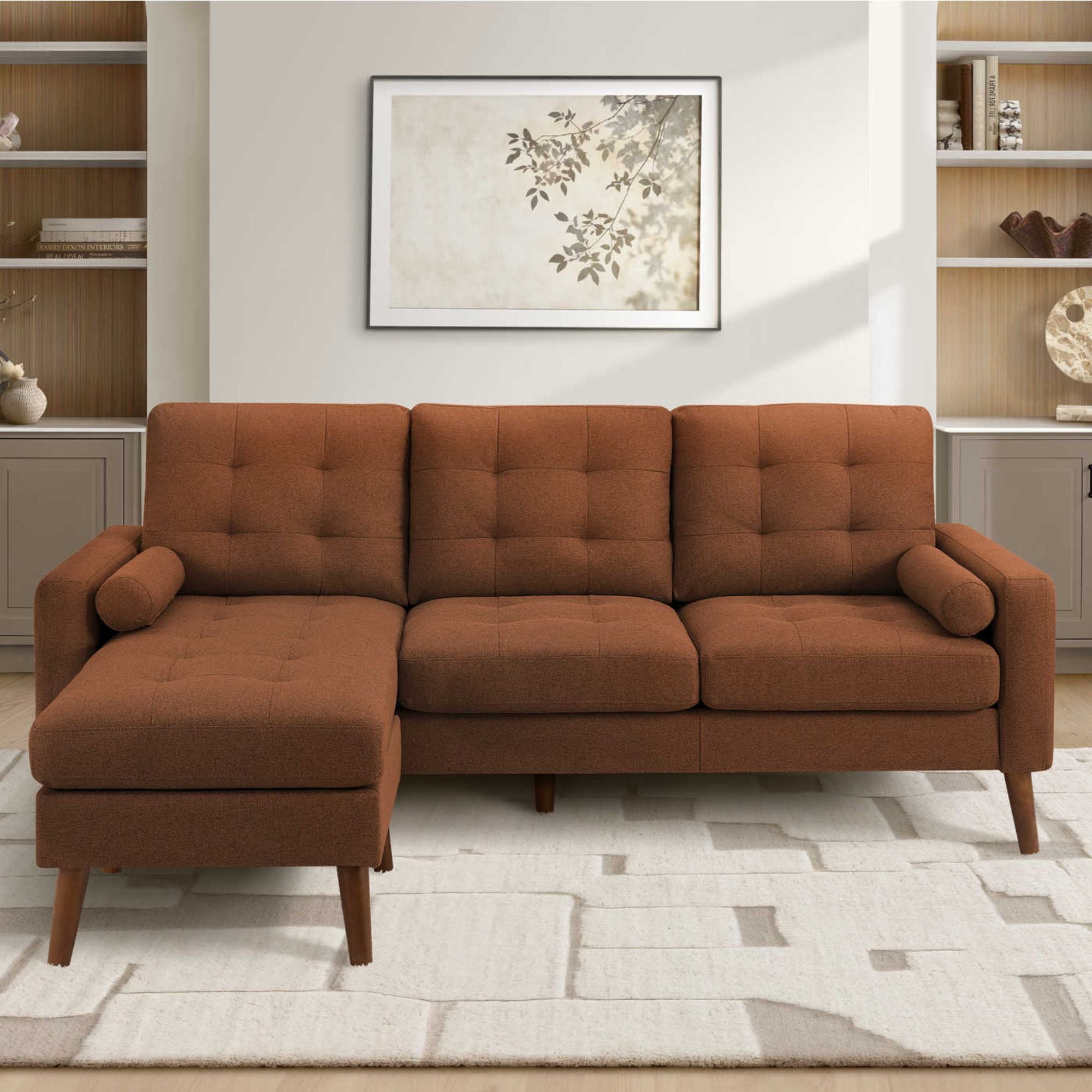 Reversible Monroe sectional sofa by Monarch Specialties in rust fabric with L-shaped design and plush cushions.