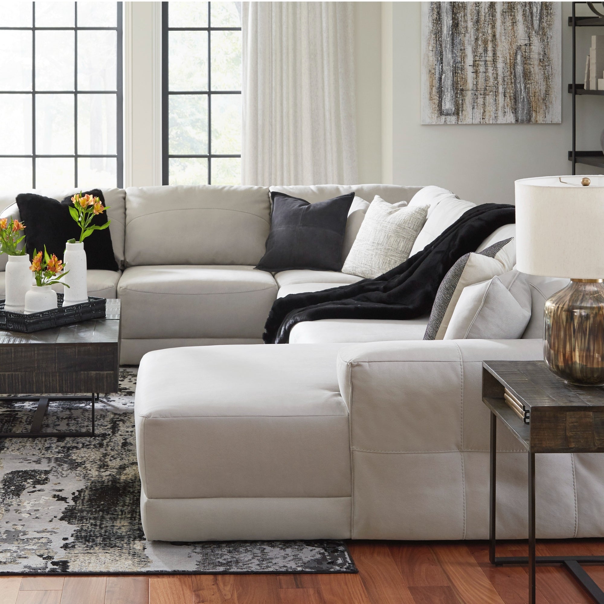 Next-Gen Gaucho 5-piece sectional with chaise by Signature Design Ashley, featuring plush fabric and modern design in a spacious living room.