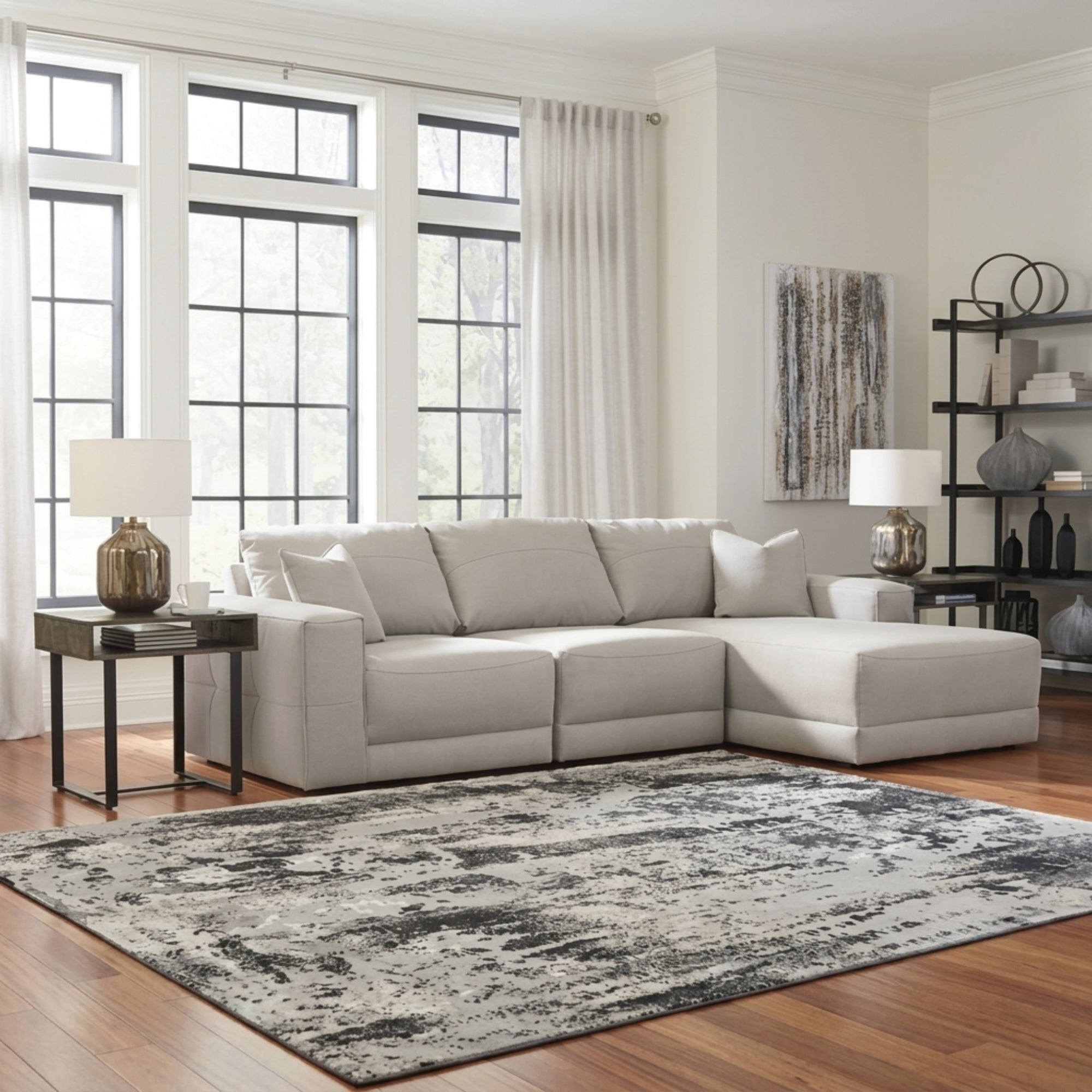 Signature Design by Ashley Next-Gen Gaucho 3-Piece sectional sofa with chaise, featuring plush cushions and modern design.