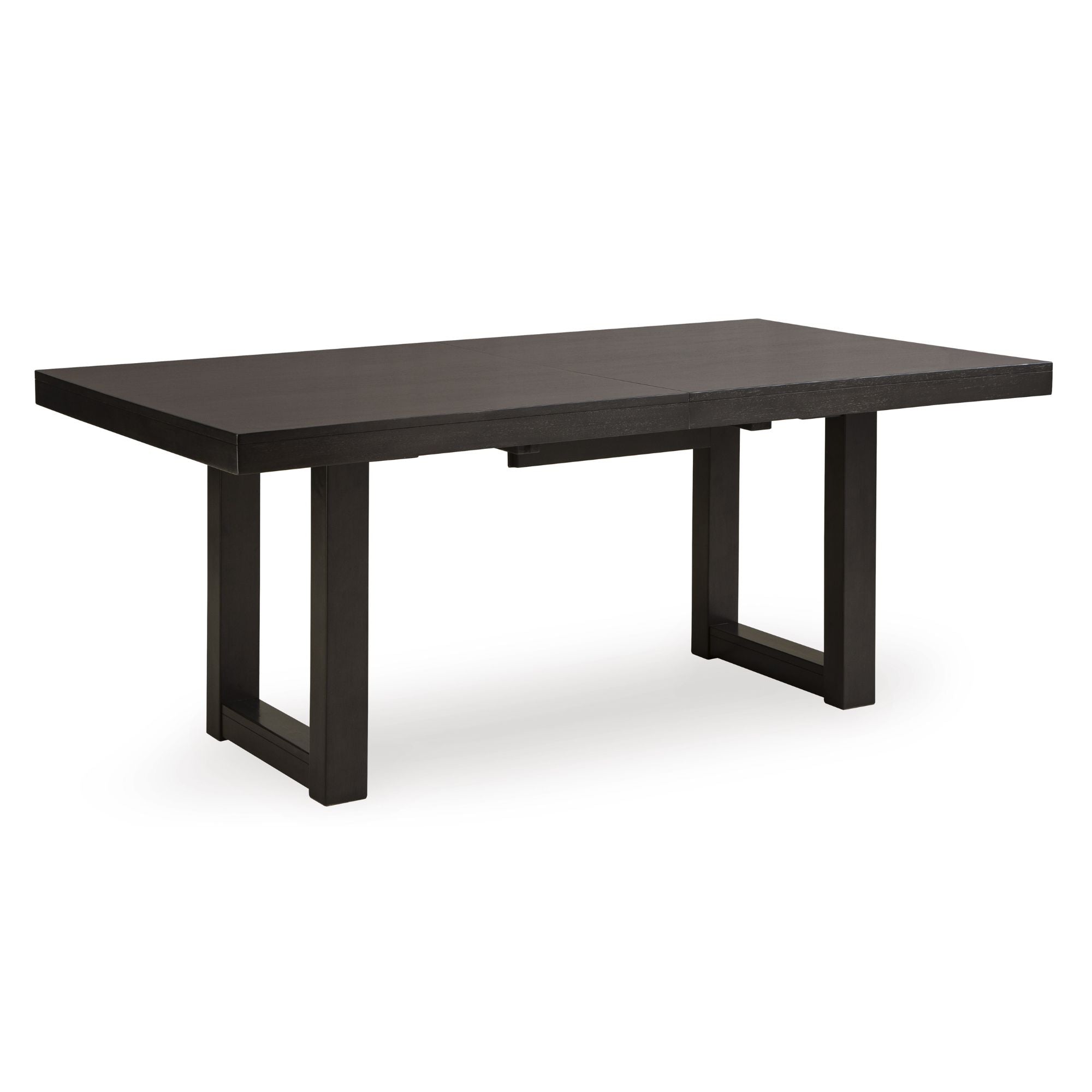 Neymorton dining extension table by Signature Ashley in a modern dining room setting with chairs and decorative accents.