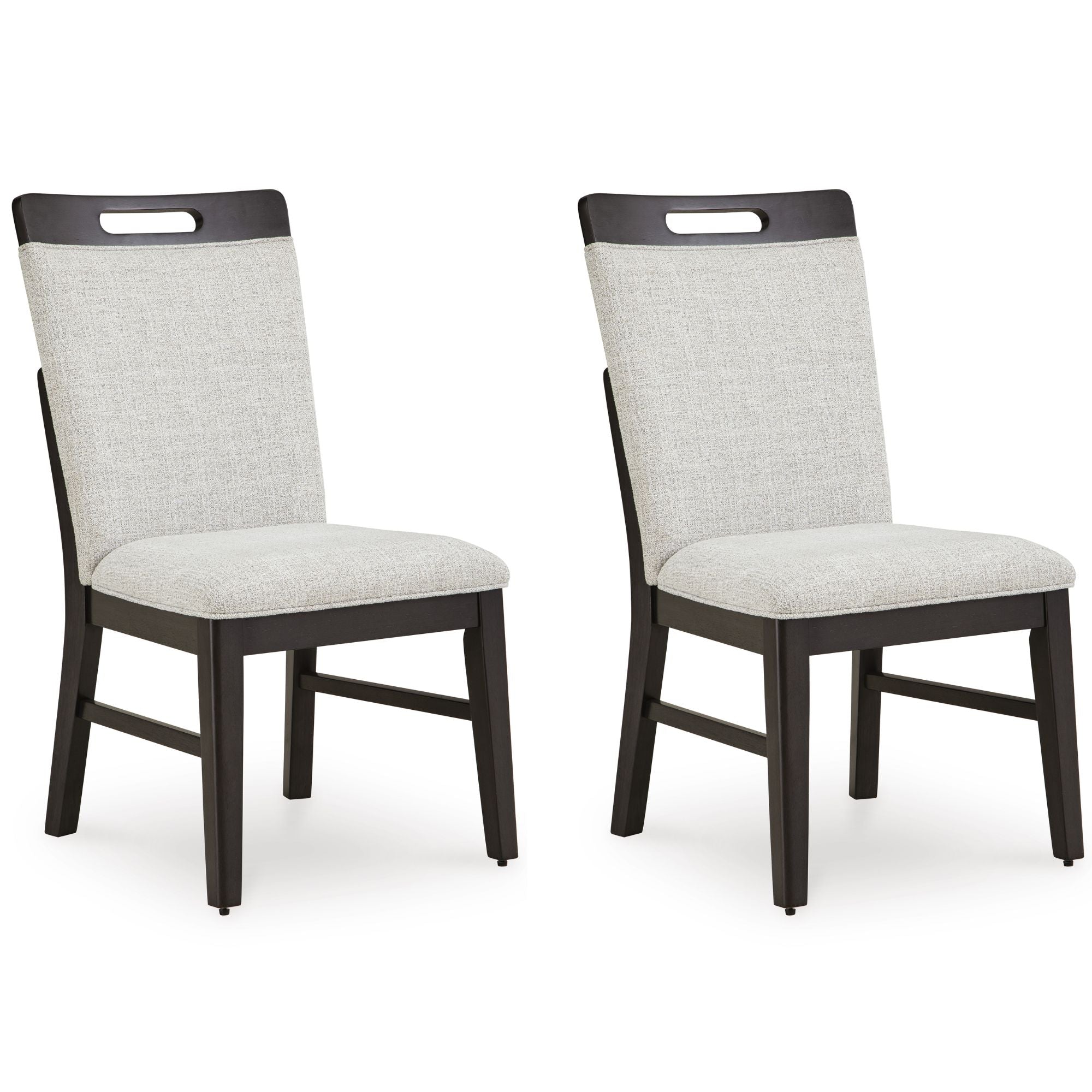 Set of two Neymorton Collection dining UPH side chairs by Signature Ashley with upholstered seats and wooden legs in a dining room setting.