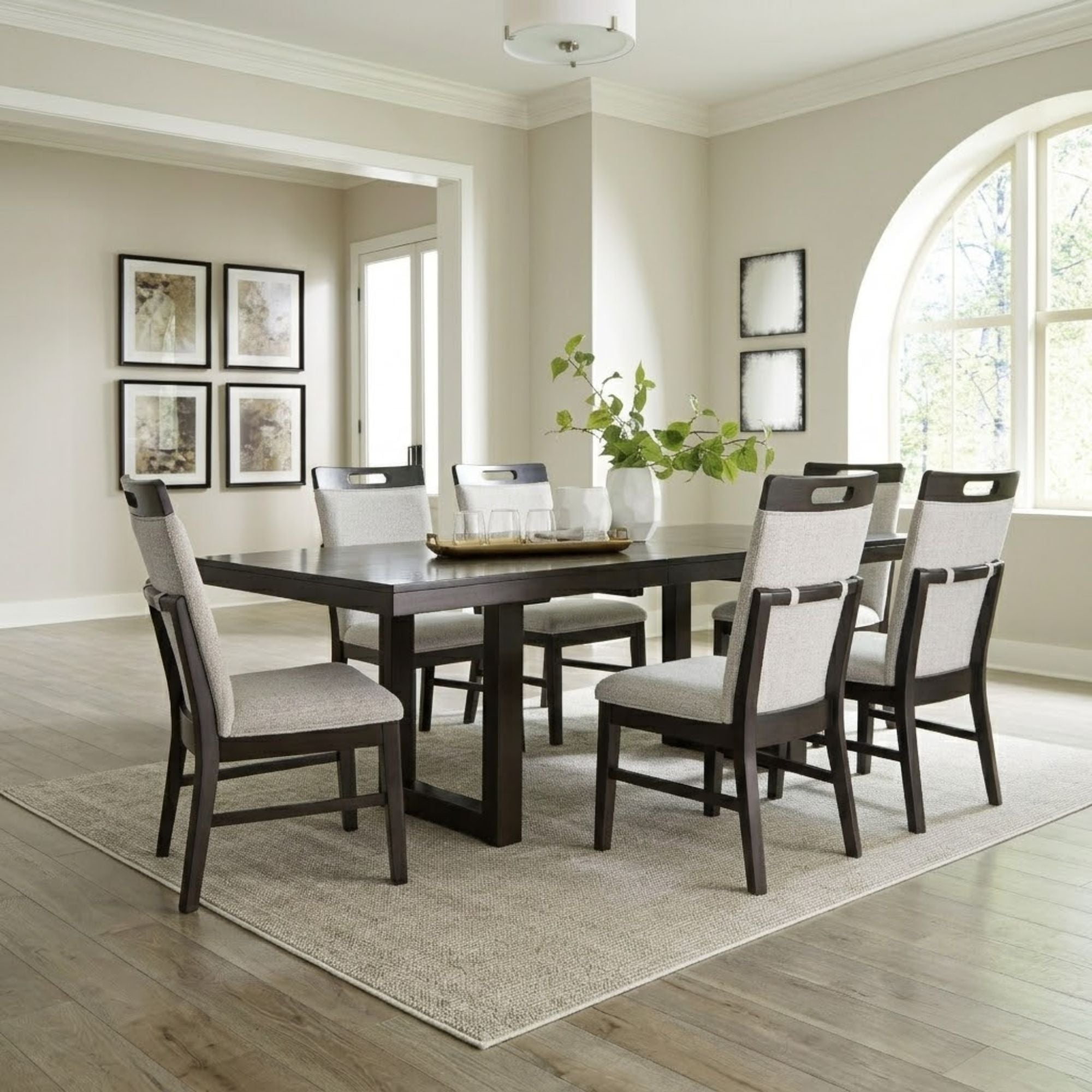 Ashley Neymorton 7-piece rectangular dining table set with butterfly extension, featuring a modern wood finish and matching chairs.