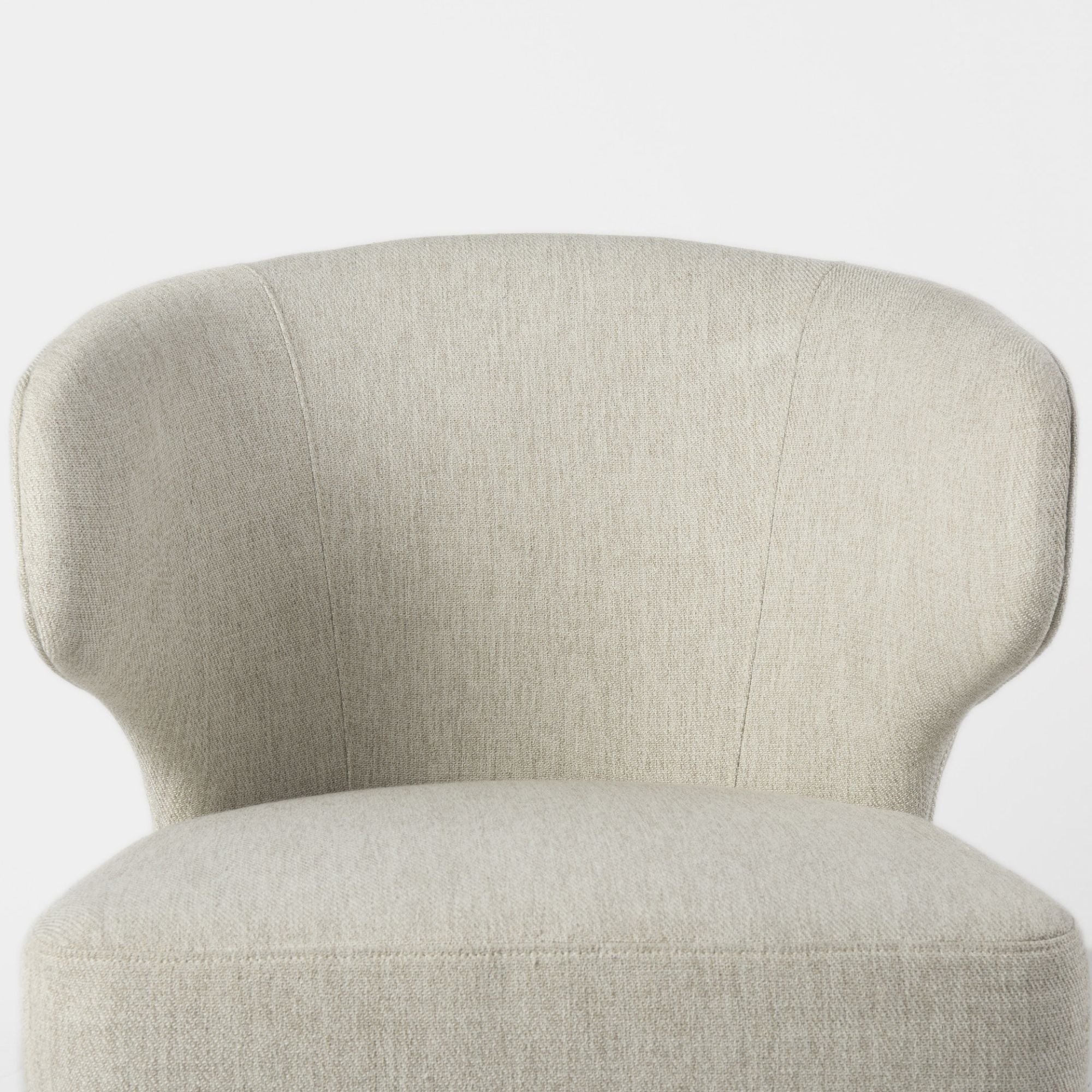 Dark brown Mercana Furniture Niles fabric dining chair with cushioned seat and backrest, showcasing a stylish and comfortable dining room accent.