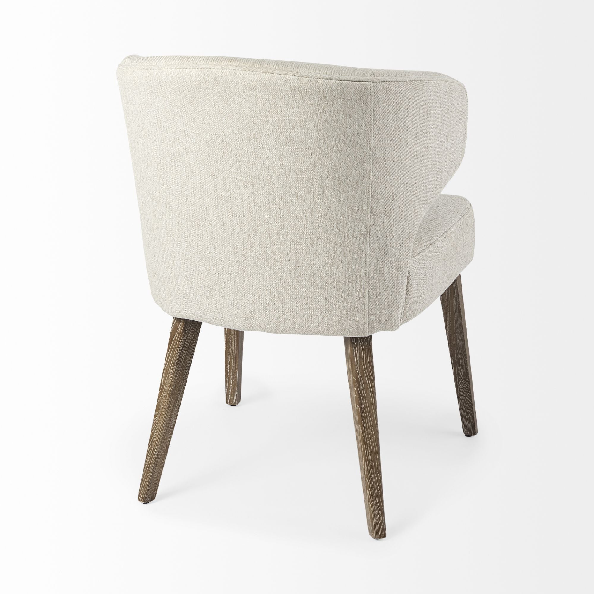 Medium brown Mercana Furniture Niles fabric dining chair with cushioned seat and backrest, showcasing a modern, comfortable design.