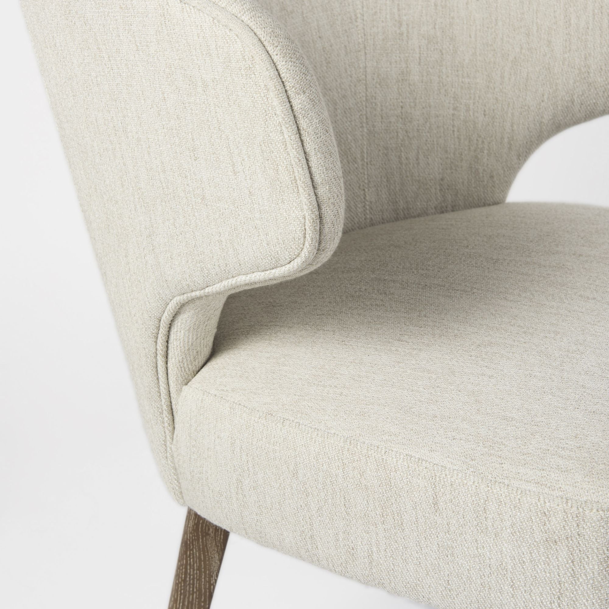 Mercana Furniture Niles fabric dining chair in medium brown with cushioned seat and wooden legs, perfect for modern dining rooms.