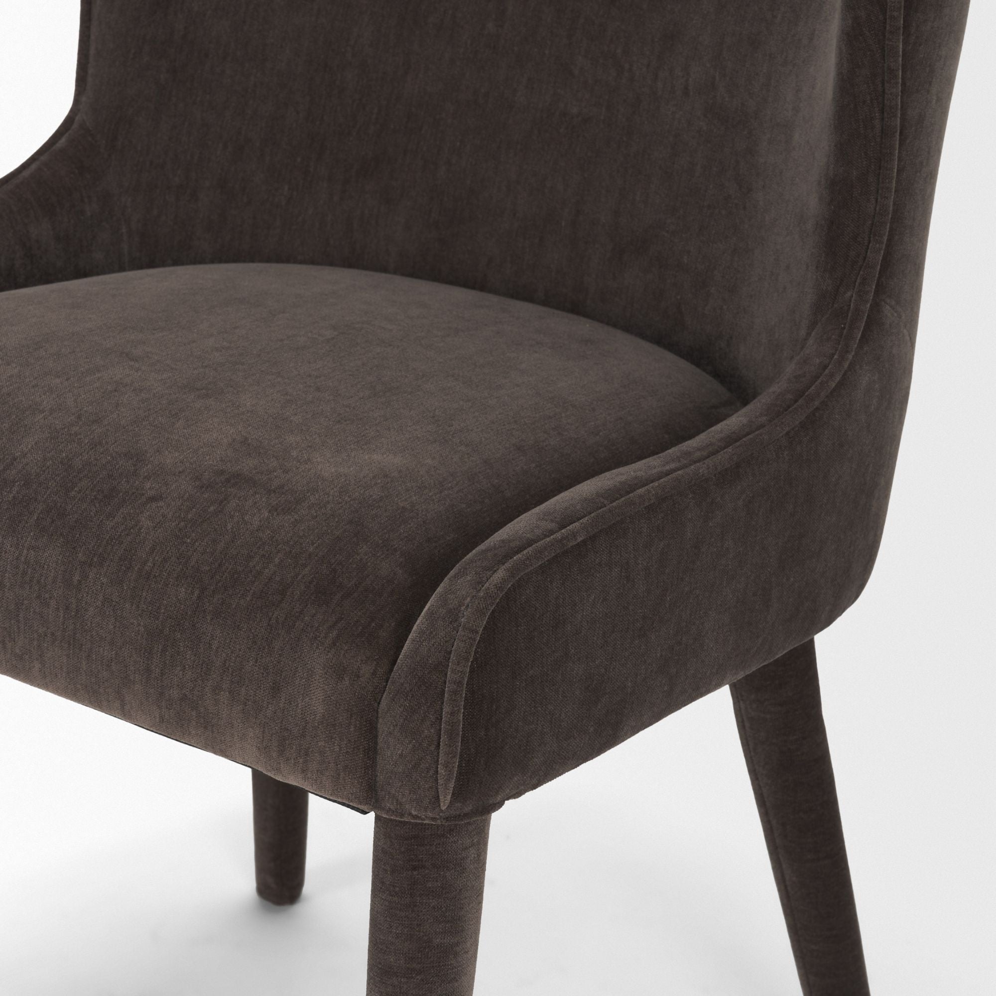 Mercana Furniture Nolan dining chair in cream chenille with a sleek, modern design and plush upholstered seat.