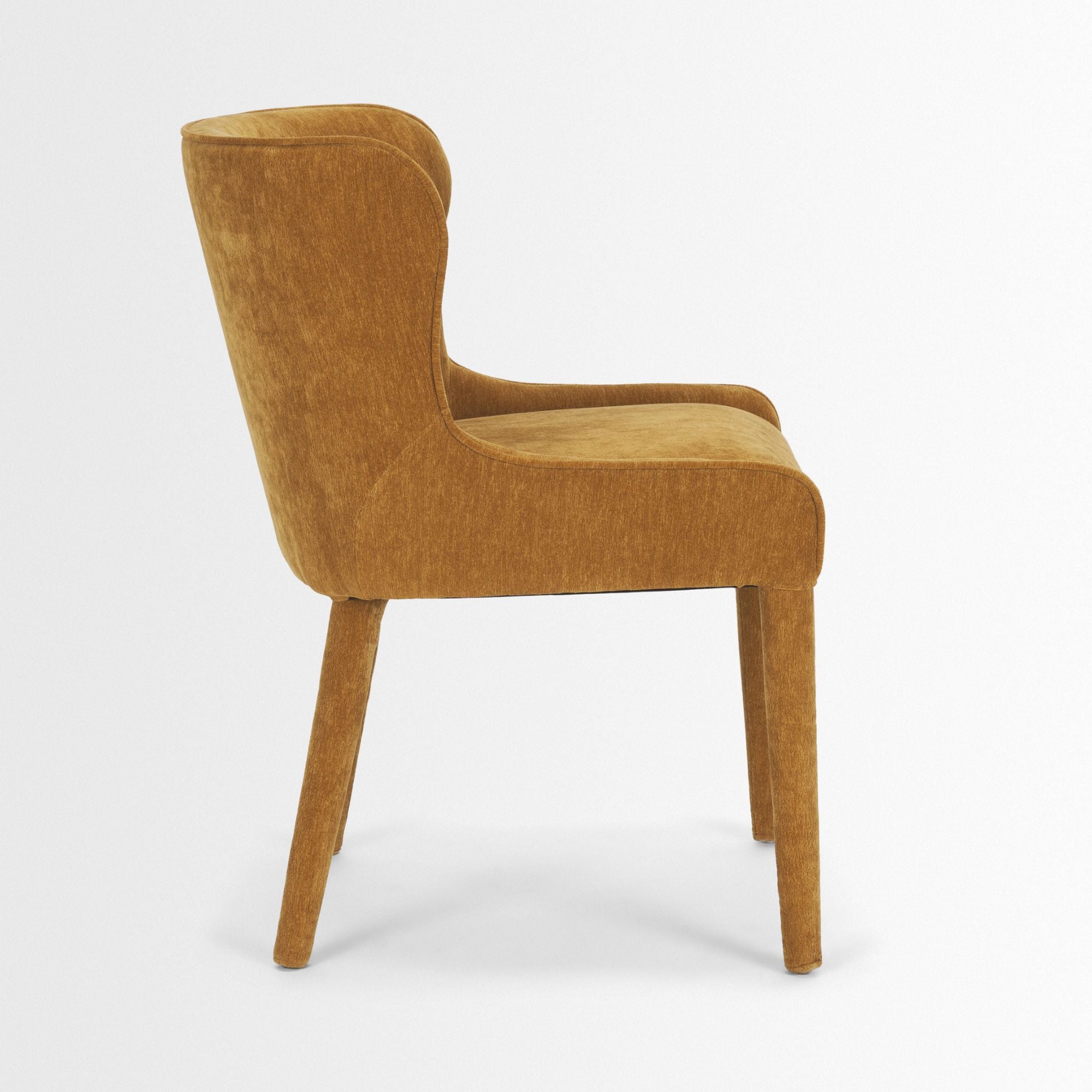 Cream chenille Nolan dining chair by Mercana Furniture with a modern design and upholstered seat and backrest.
