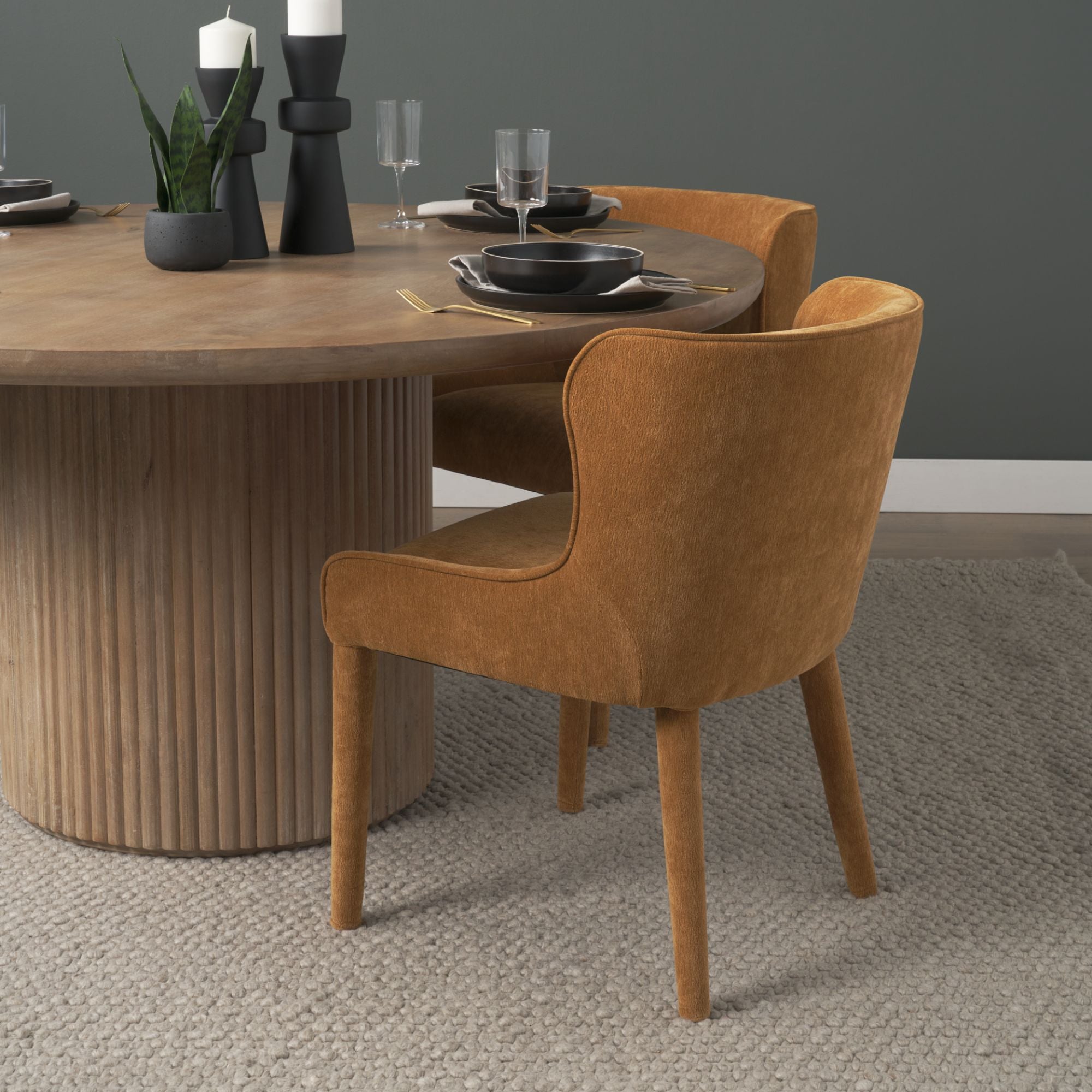 Mercana Furniture Nolan dining chair with cream chenille upholstery and wooden legs, showcasing elegant dining room furniture.