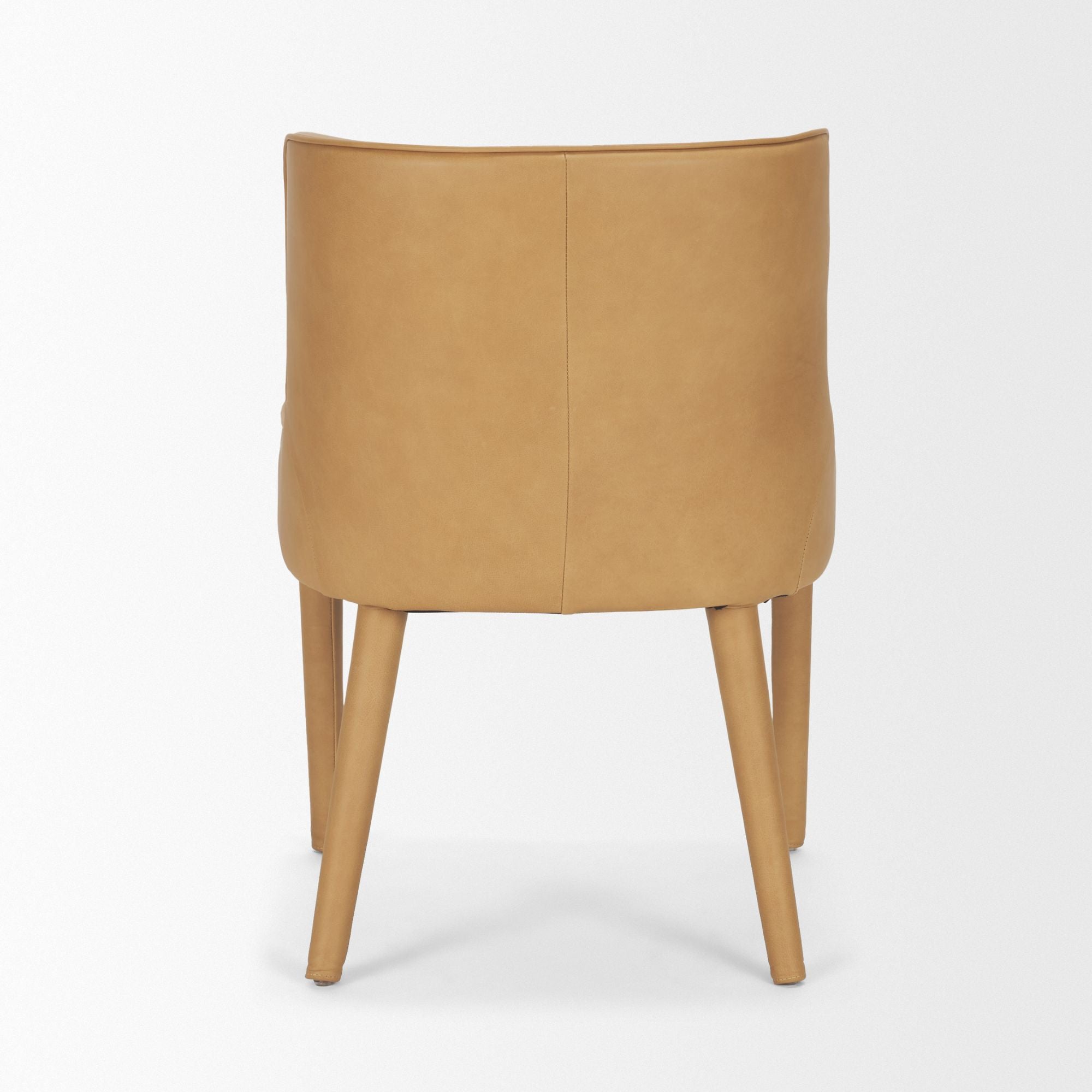 Mercana Furniture Nolan leather dining chair with padded seat and backrest, showcasing a stylish and comfortable dining room seating option.