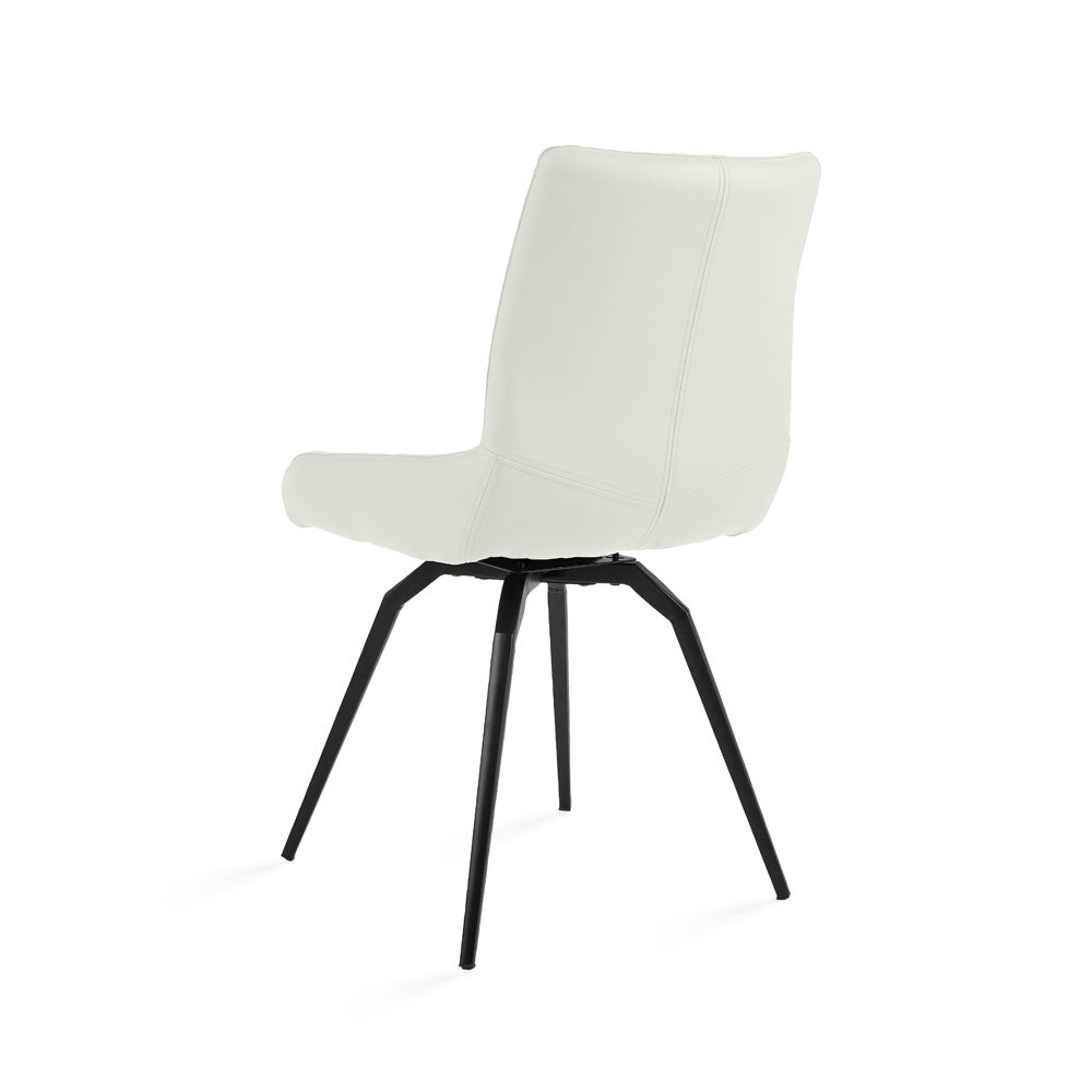 Pair of Xcella Nona swivel dining chairs with white PU upholstery and modern Norman back design.