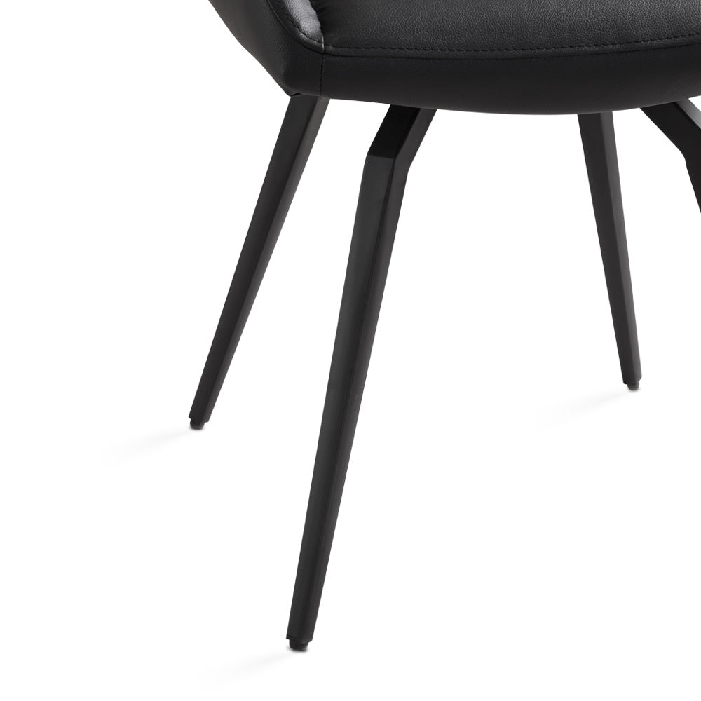 Pair of Xcella Nona swivel dining chairs with modern design and wooden legs, shown from a side angle.