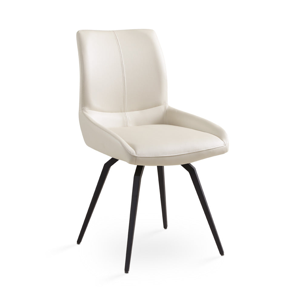 Pair of Xcella Nona swivel dining chairs with cushioned seats and modern design, shown in a stylish kitchen setting.
