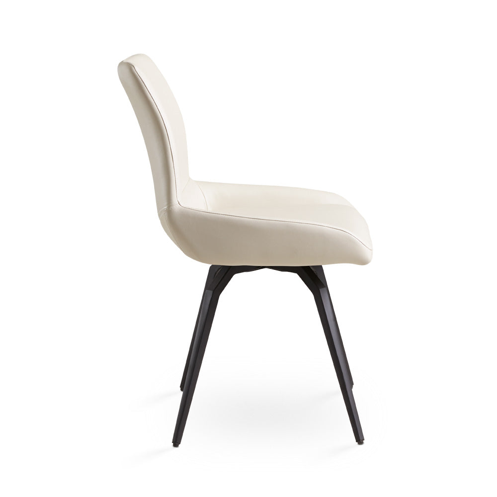 Set of two Xcella Nona swivel dining chairs with cushioned seats and modern design, shown from a side angle.