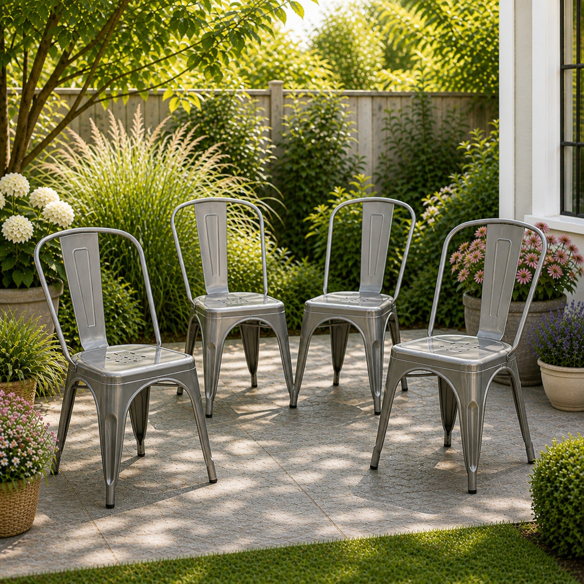 Set of two Elite Living Rochelle stackable dining chairs in gunmetal steel for outdoor use, featuring modern design and durable construction.