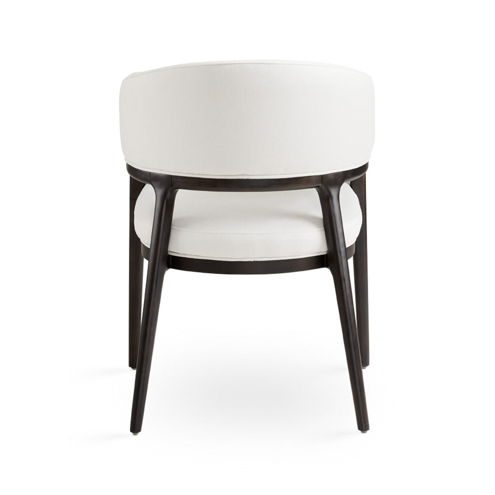 White Erica dining chair by Xcella with a sleek backrest, designed for modern kitchen and dining room seating.