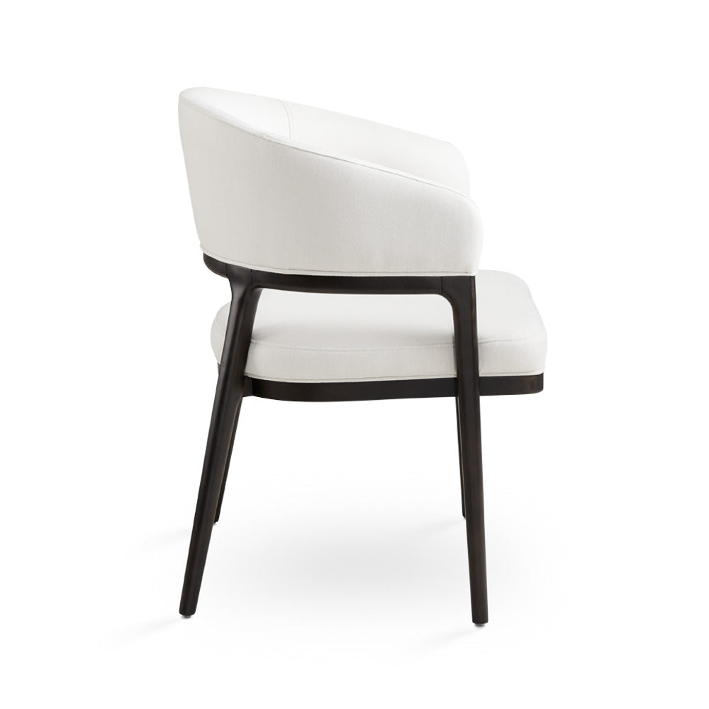 White Erica dining chair by Xcella, kitchen and dining room chair with a sleek side view showing modern design and clean lines.