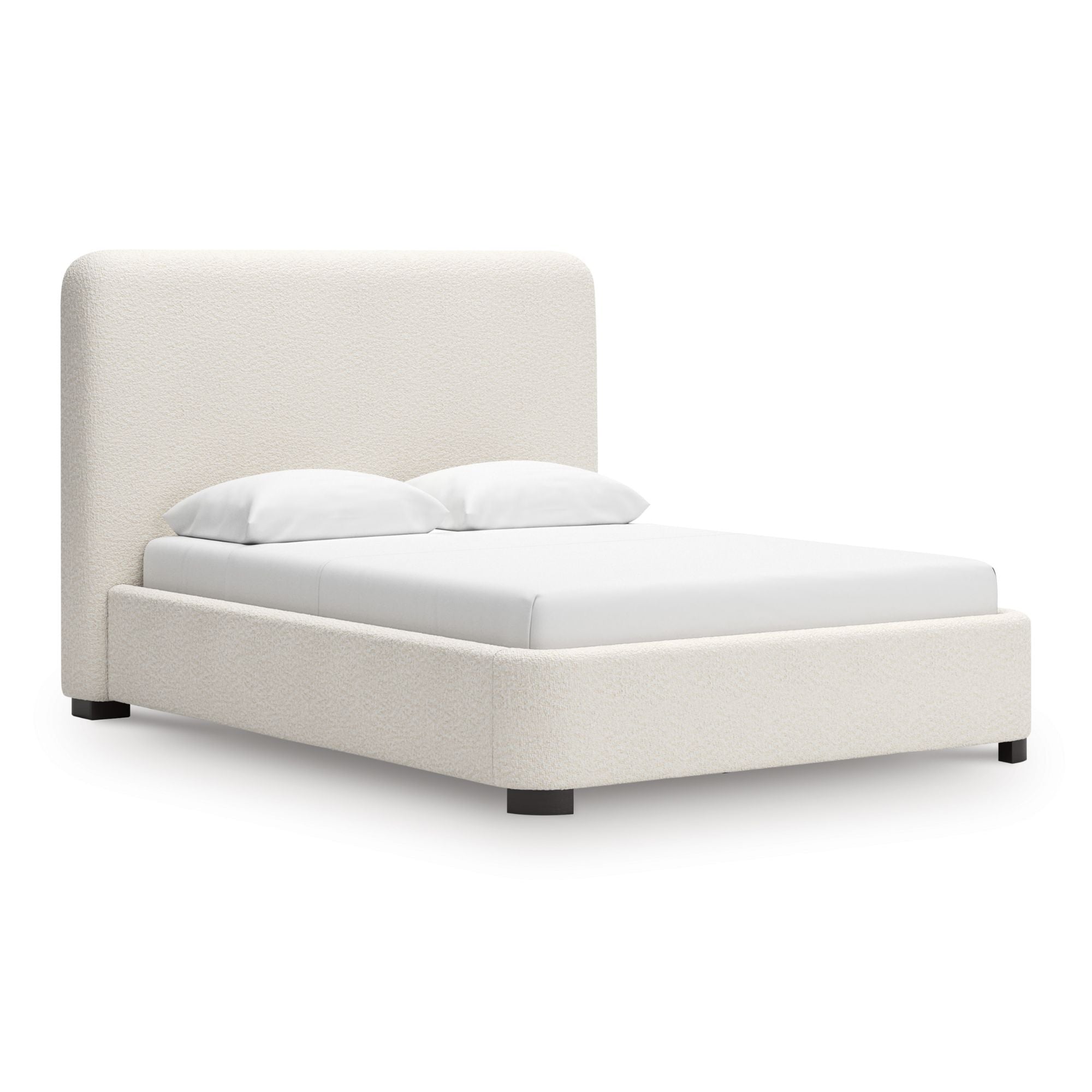 Signature Ashley Brintstreet Upholstered Wing Bed with plush fabric, tufted headboard, and elegant winged sides in a modern bedroom setting.