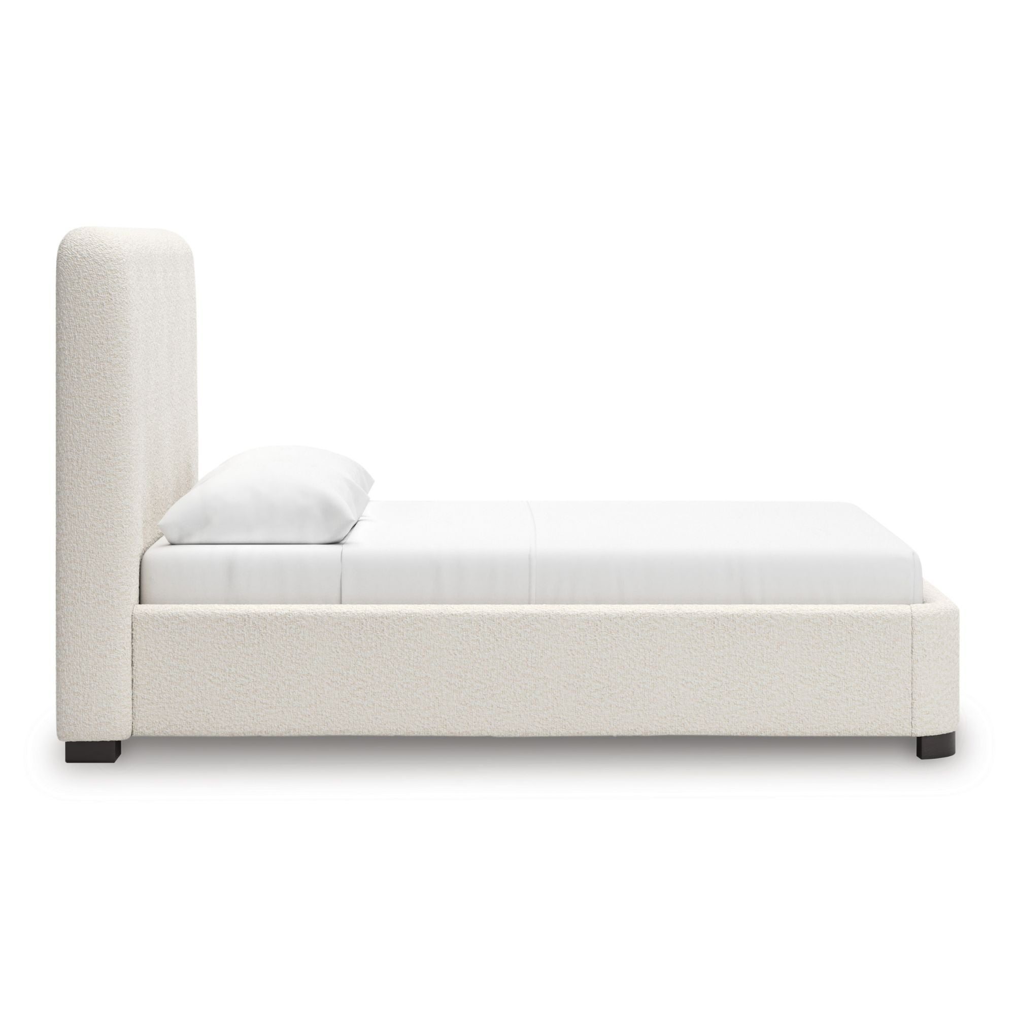 Signature Ashley Brintstreet upholstered wing bed with padded headboard and fabric upholstery, showcased in a stylish bedroom setting.