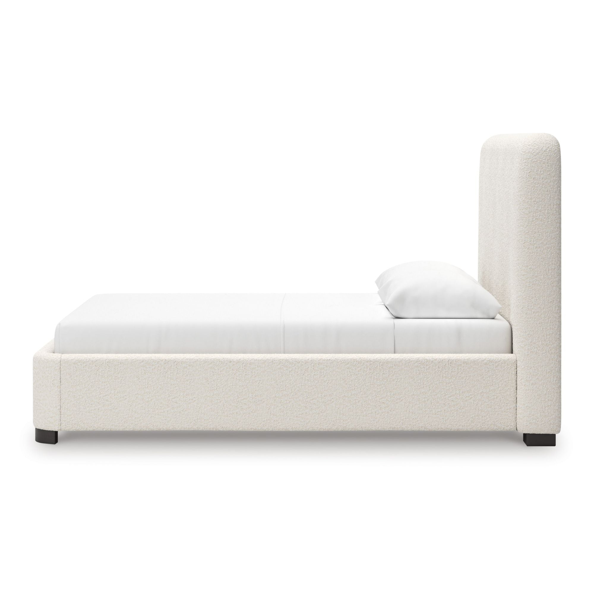 Signature Ashley Brintstreet Upholstered Wing Bed with tufted headboard and soft fabric upholstery in a stylish bedroom setting.