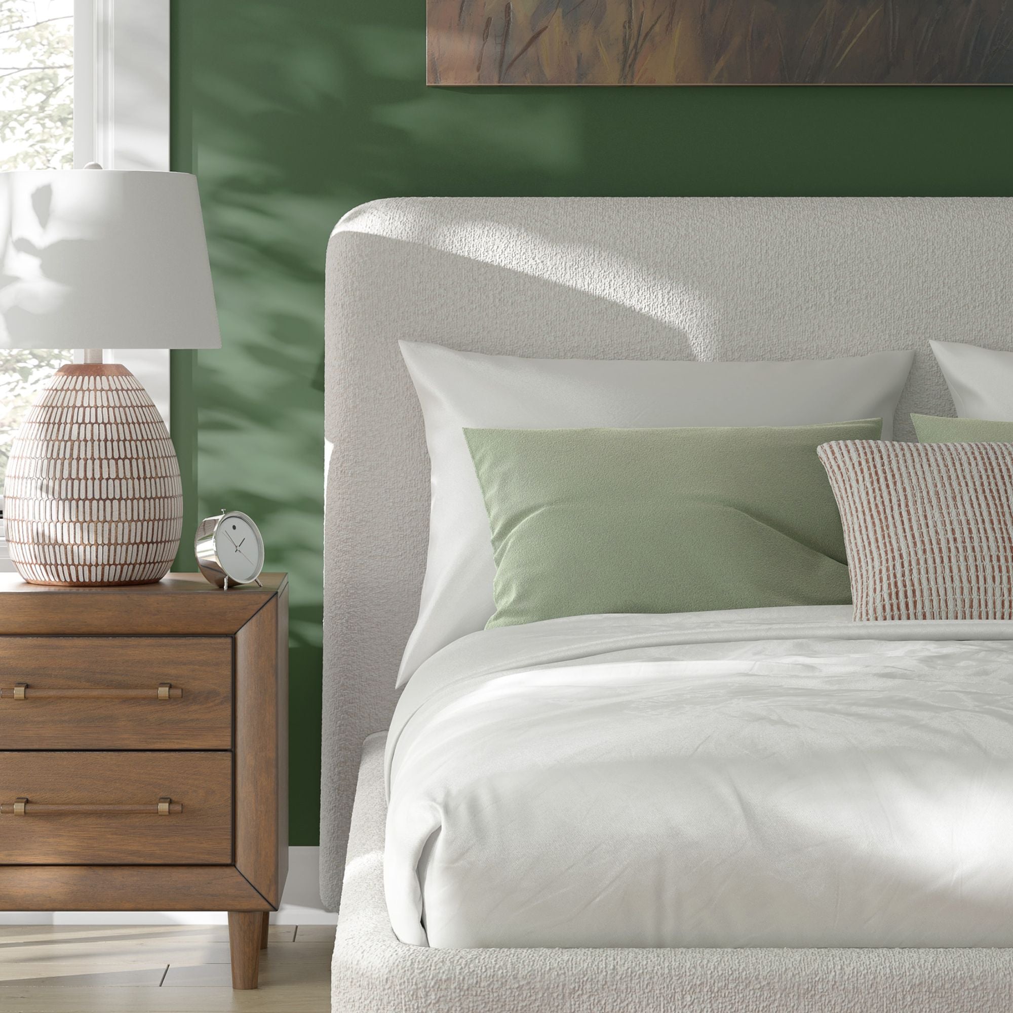 Signature Ashley Brintstreet upholstered wing bed with padded headboard and winged sides in a cozy fabric, shown in a bedroom setting.