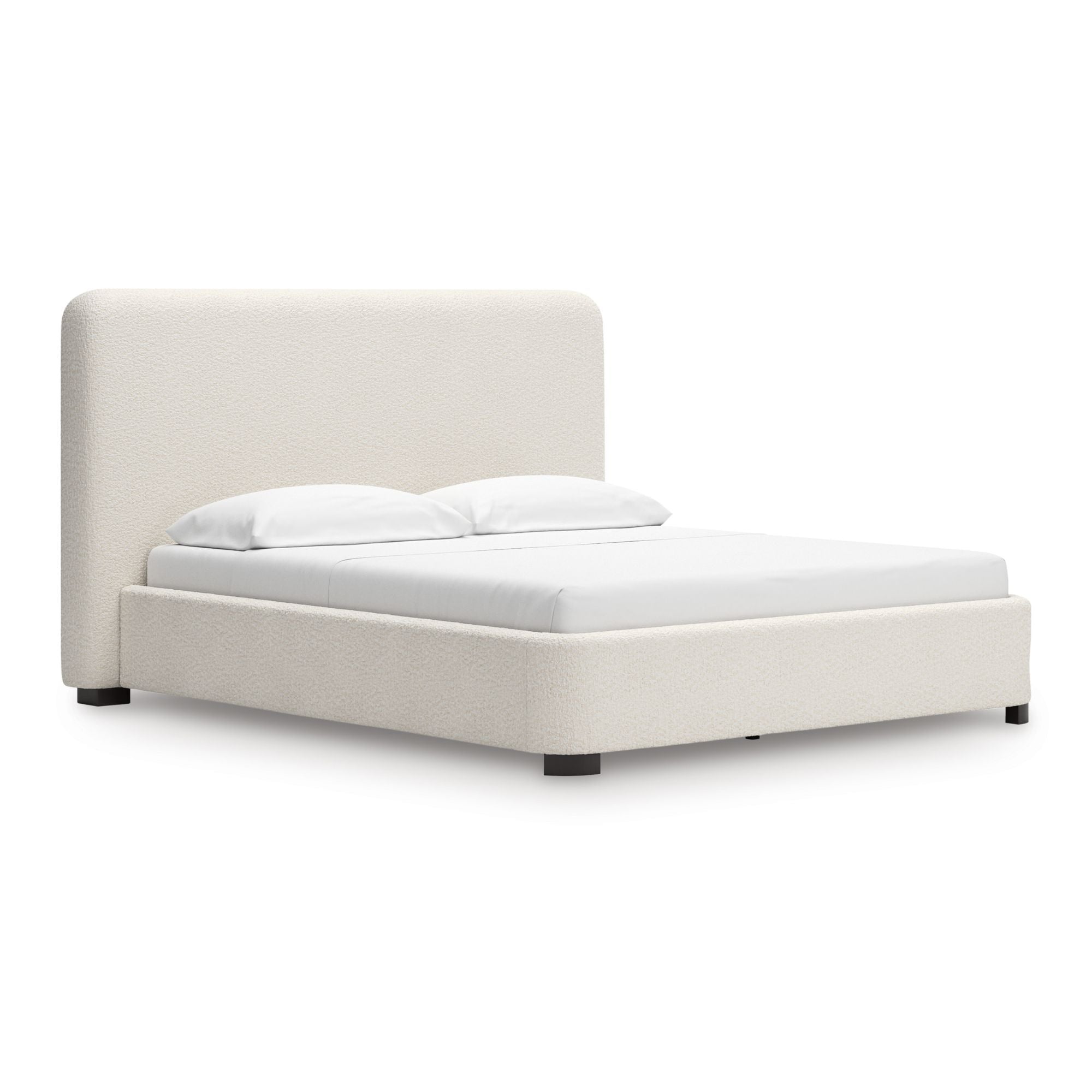 Signature Ashley Brintstreet upholstered wing bed with plush fabric and padded headboard in a modern bedroom setting.