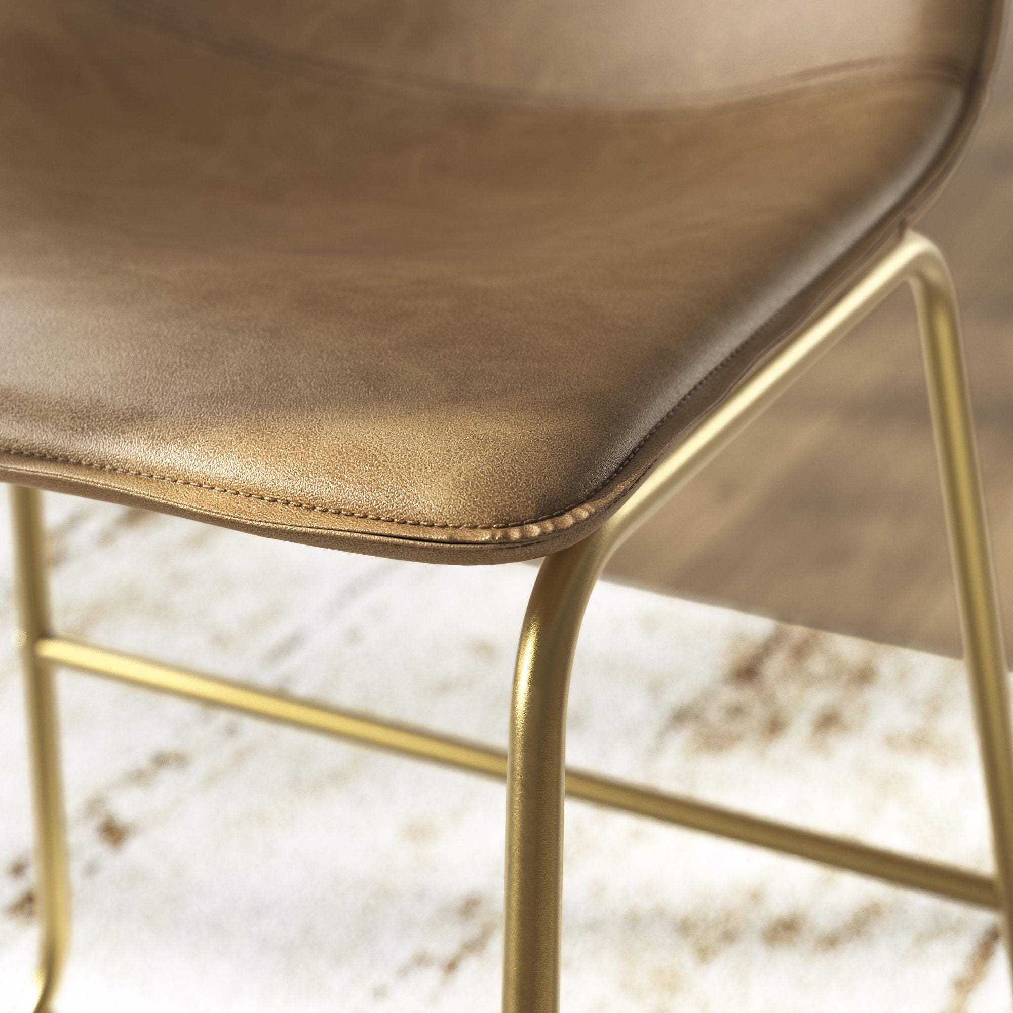 Set of two Ciabori UPH dining chairs in toast and gold finish by Signature Ashley, showcasing modern upholstery and sleek design.