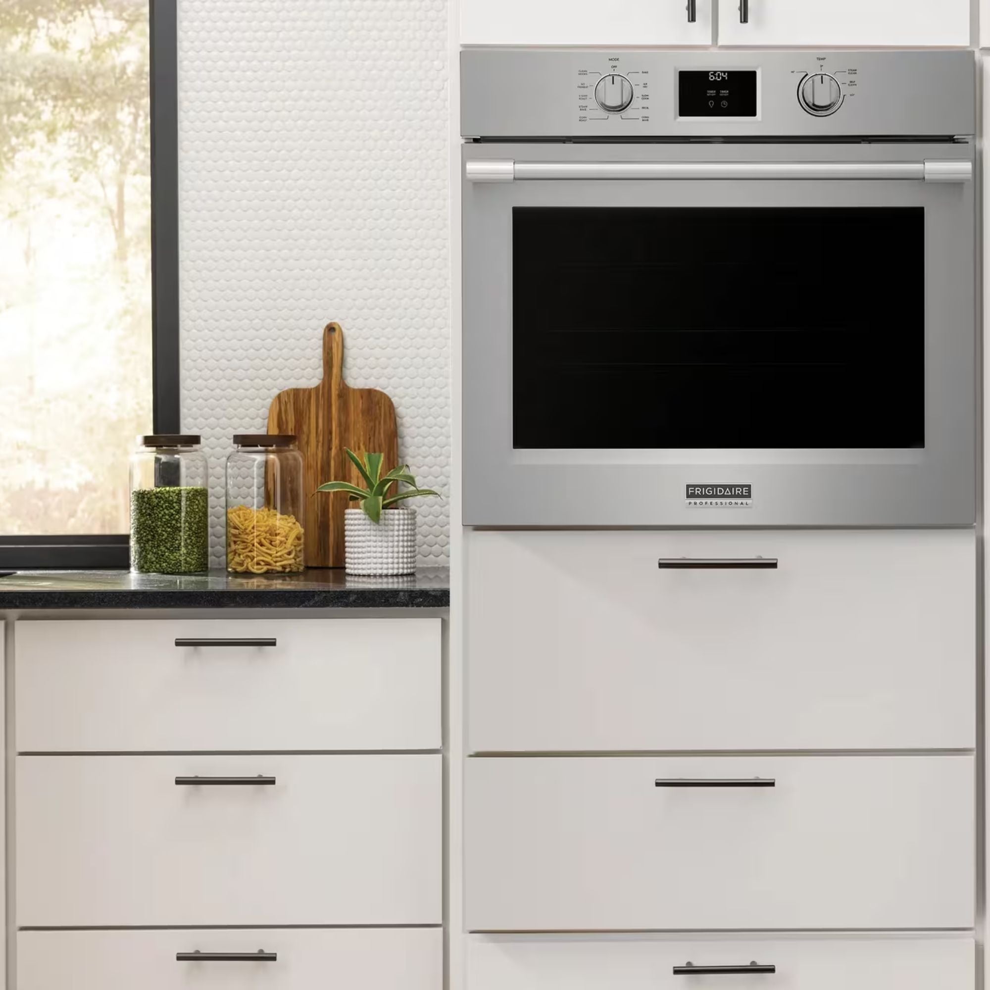Frigidaire Professional 30-inch stainless steel single wall oven with total convection cooking, sleek modern design.
