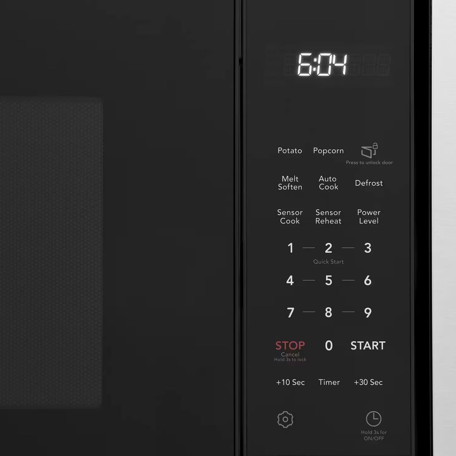 Stainless steel Frigidaire Professional microwave with digital control panel and interior light, built-in design for modern kitchens.
