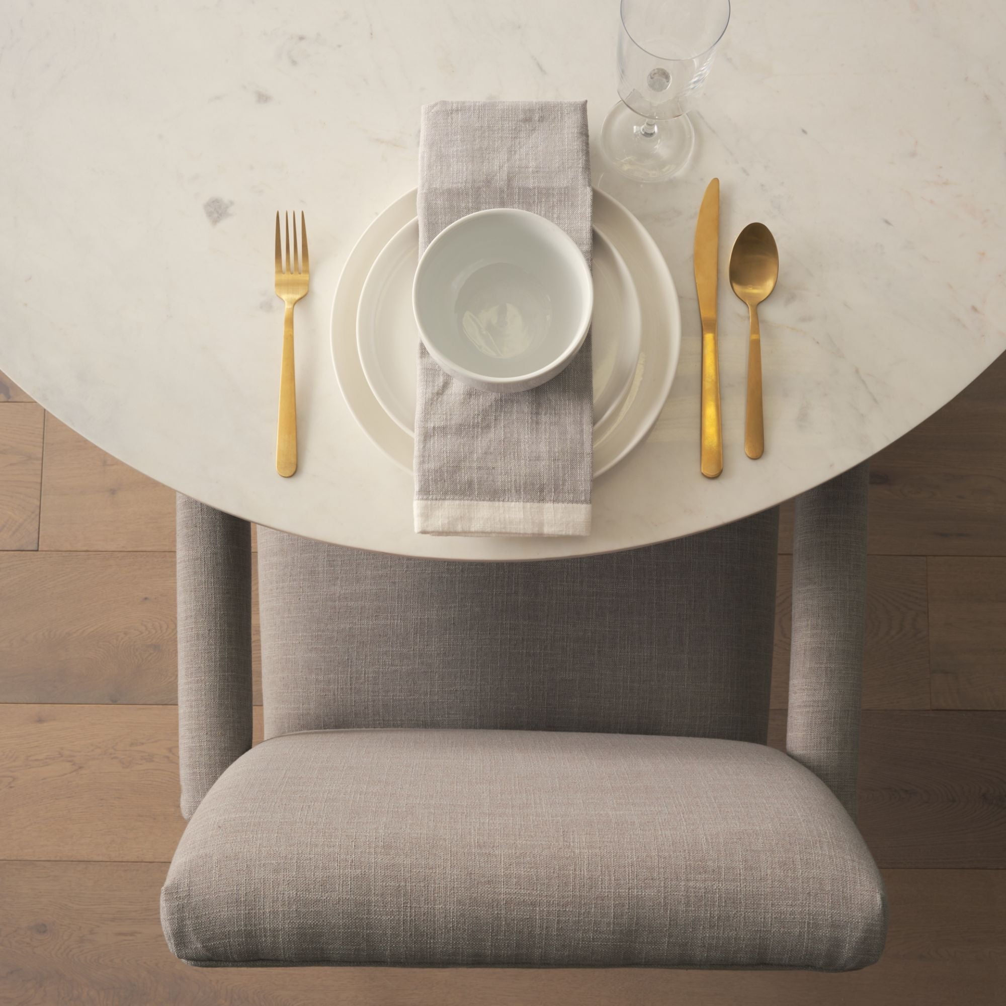 Mercana Furniture Palisades gray dining armchair with cushioned seat and modern design, ideal for contemporary dining rooms.