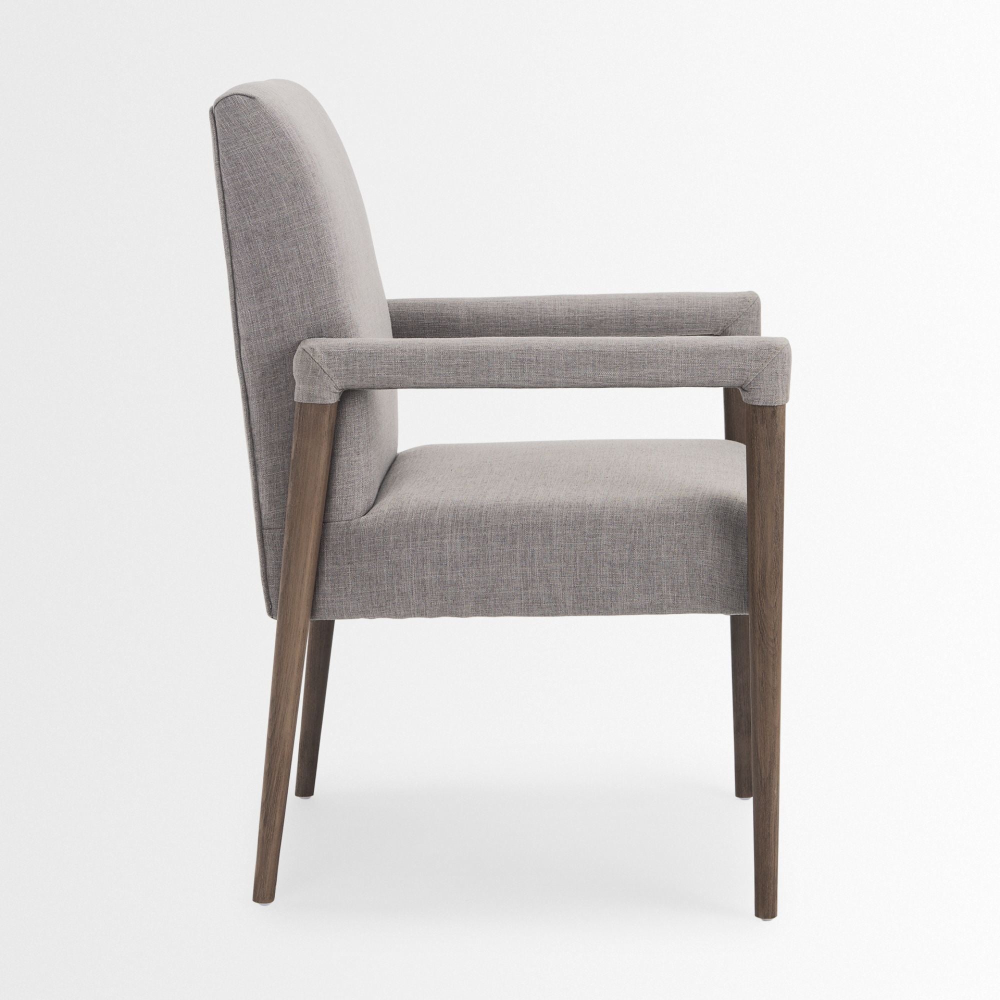 Gray Mercana Palisades dining armchair with wooden legs and padded backrest, stylish and comfortable for modern dining rooms.