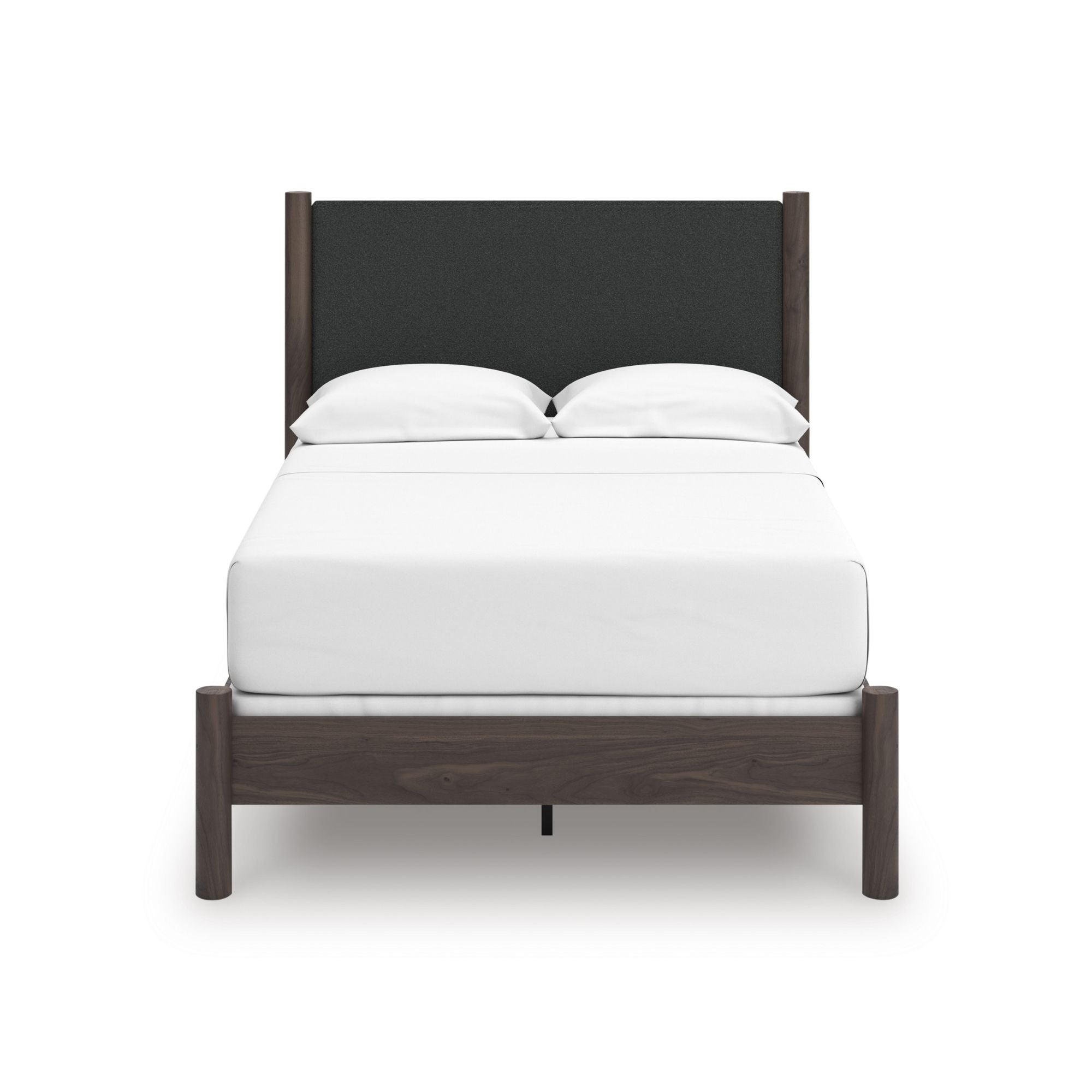 Signature Ashley Pamytta upholstered panel platform bed in a modern bedroom setting with neutral fabric and sleek design.