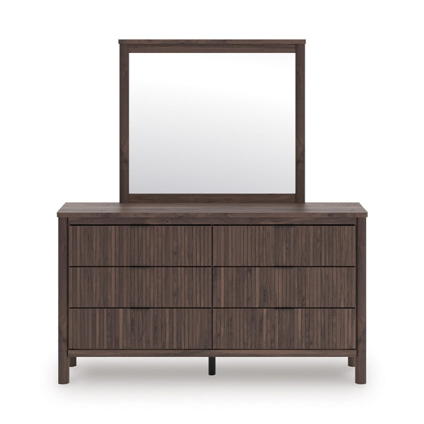 Signature Ashley Pamytta dresser and mirror set in a modern bedroom with wood finish and sleek design.