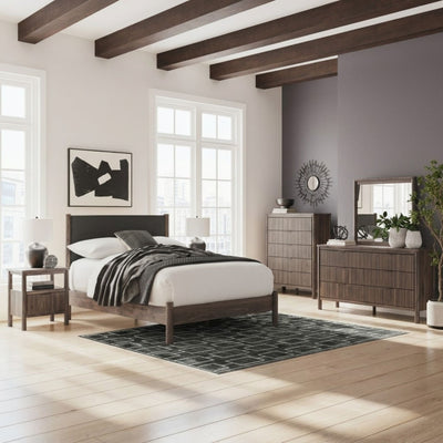 Pamytta upholstered panel platform bedroom set by Signature Ashley, featuring a bed with a padded headboard and matching nightstands.