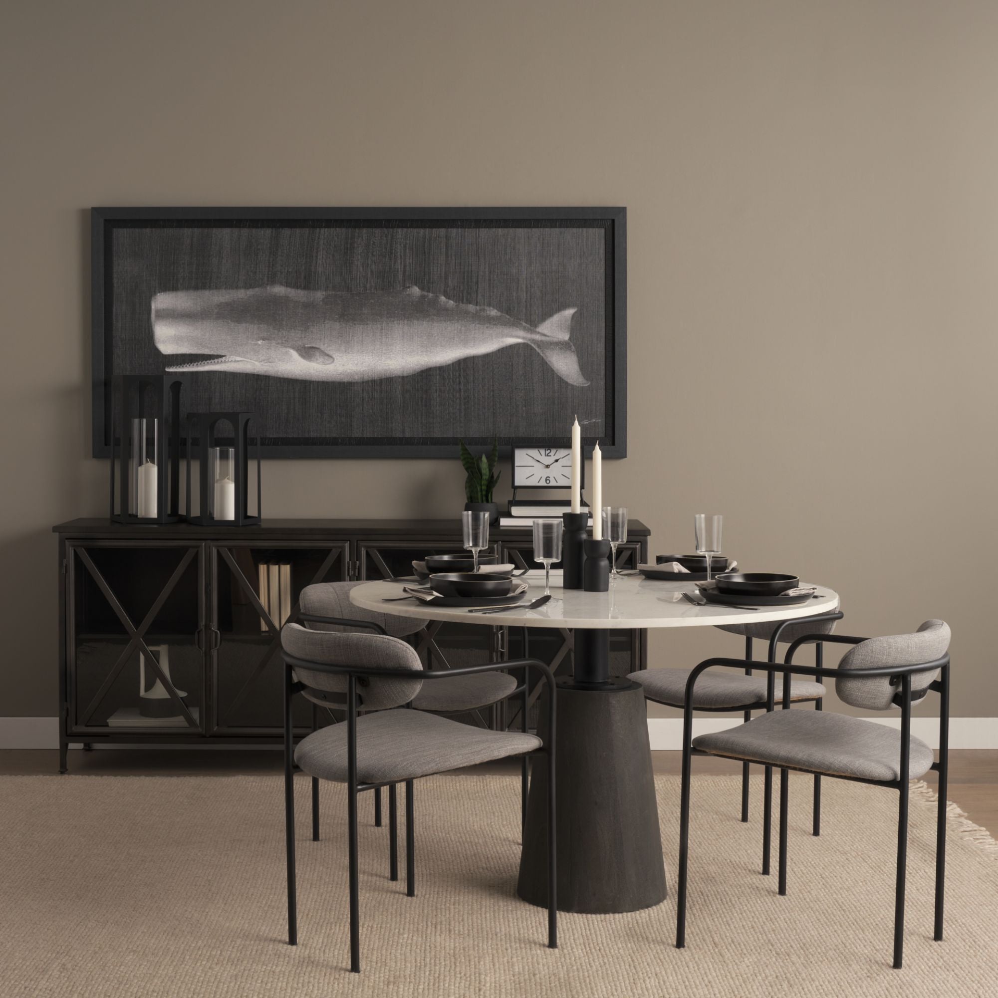 Gray Parker dining chair by Mercana Furniture featuring a modern design with a cushioned seat and wooden legs.