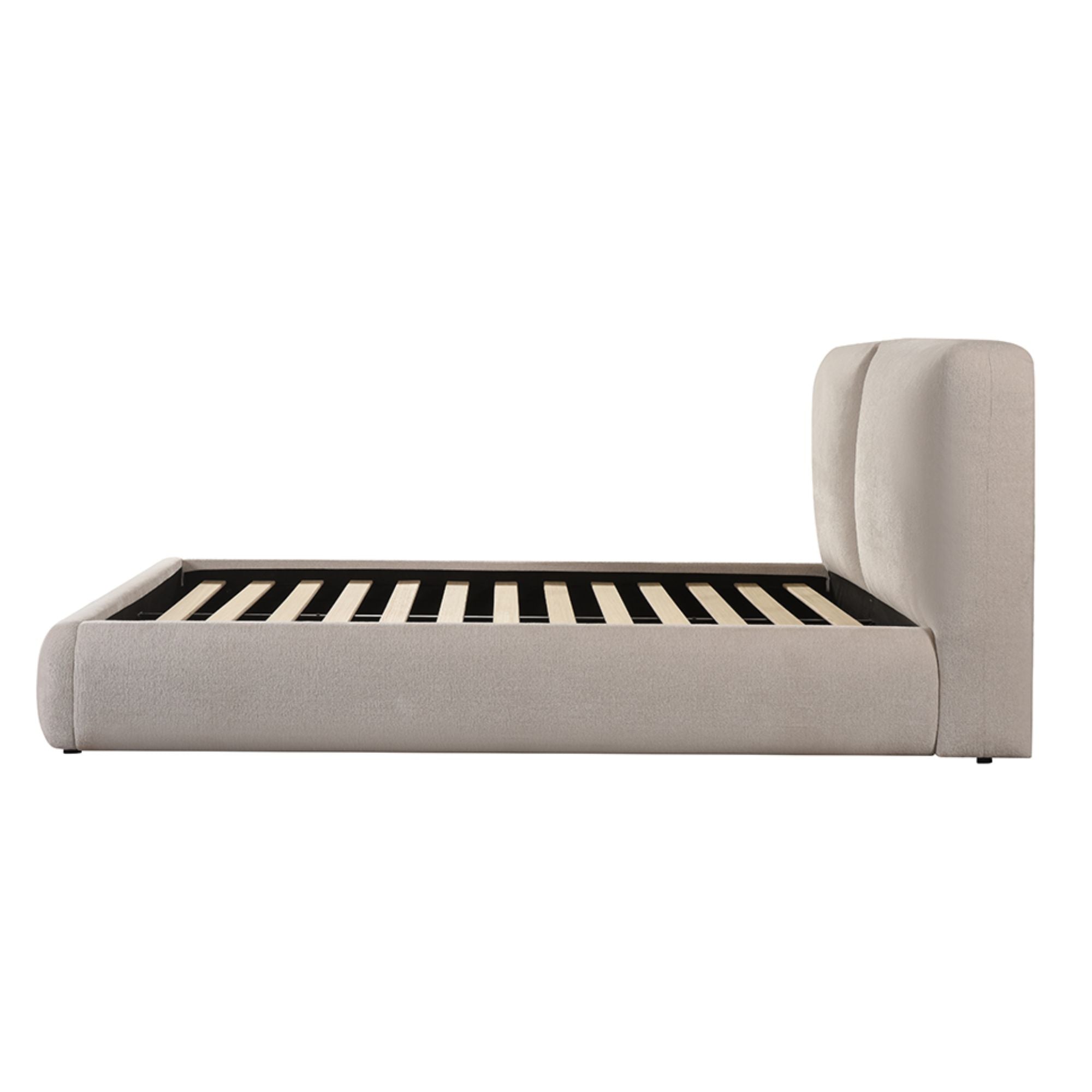 Beige silhouette modern platform bed by Brassex with a sleek design and clean lines, shown in a stylish bedroom setting.