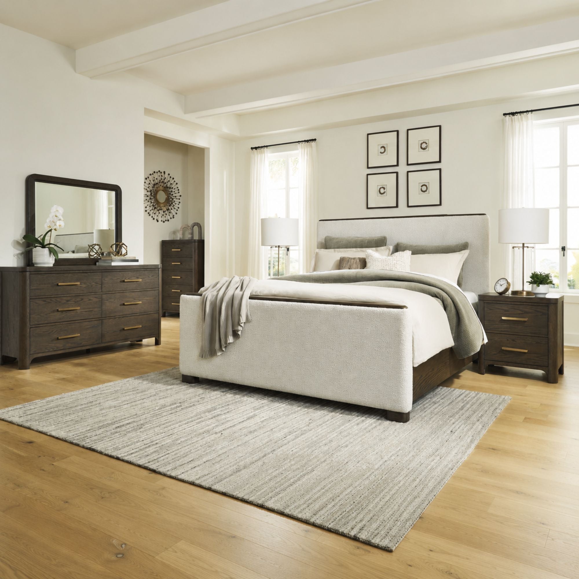 Signature Design by Ashley Radkin upholstered panel bedroom set featuring a bed with a padded headboard and matching bedroom furniture.