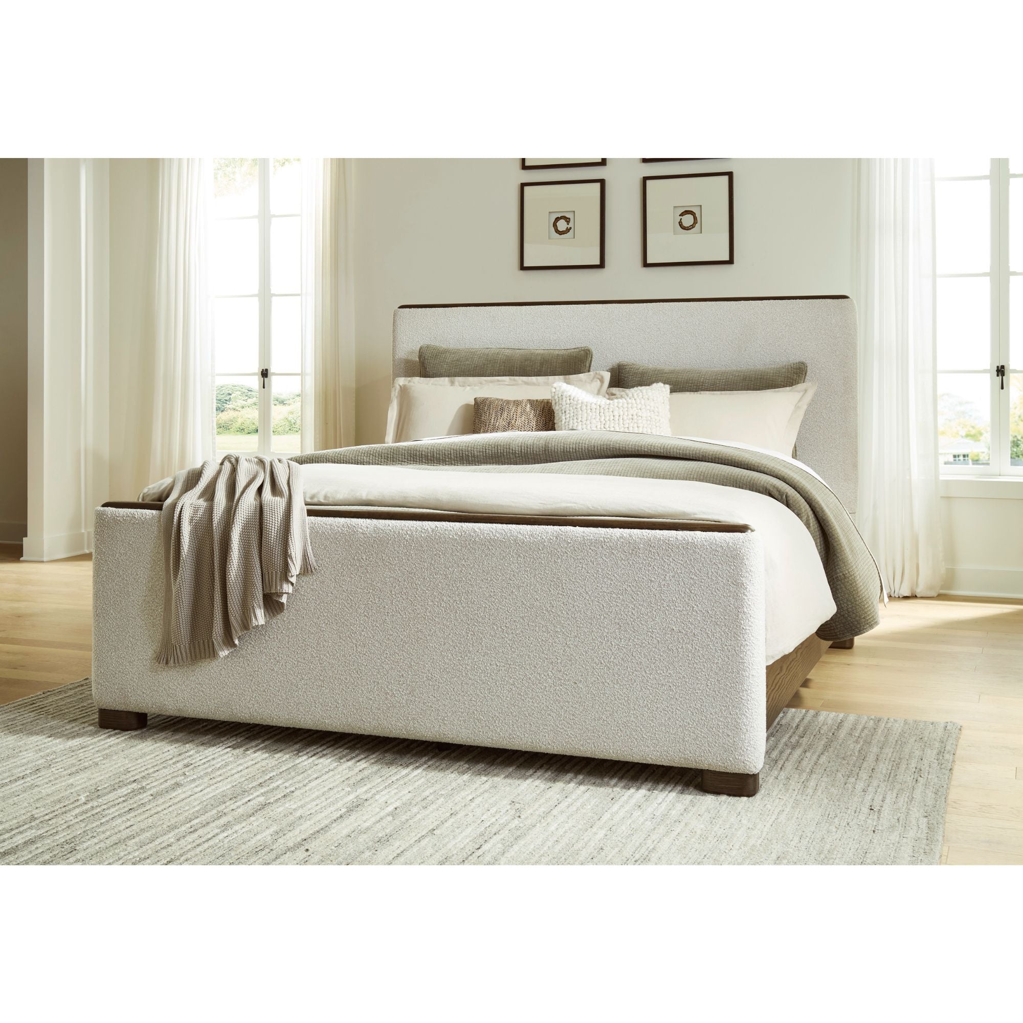 Radkin upholstered panel bed from Signature Design by Ashley in a stylish bedroom setting, showcasing its fabric headboard and modern design.