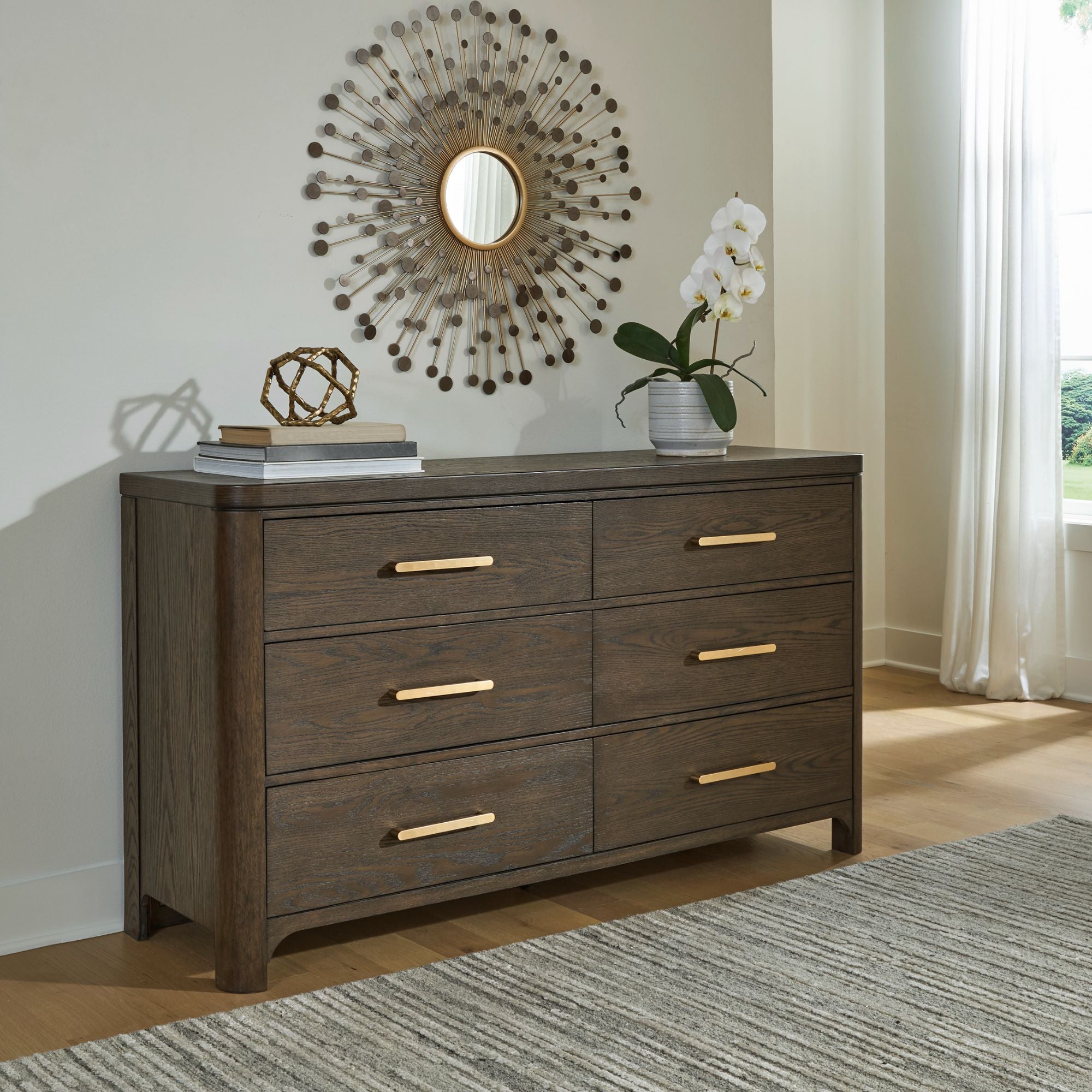 Radkin dresser and mirror from Signature Design by Ashley, showcasing a stylish bedroom furniture set with wood finish and modern design.